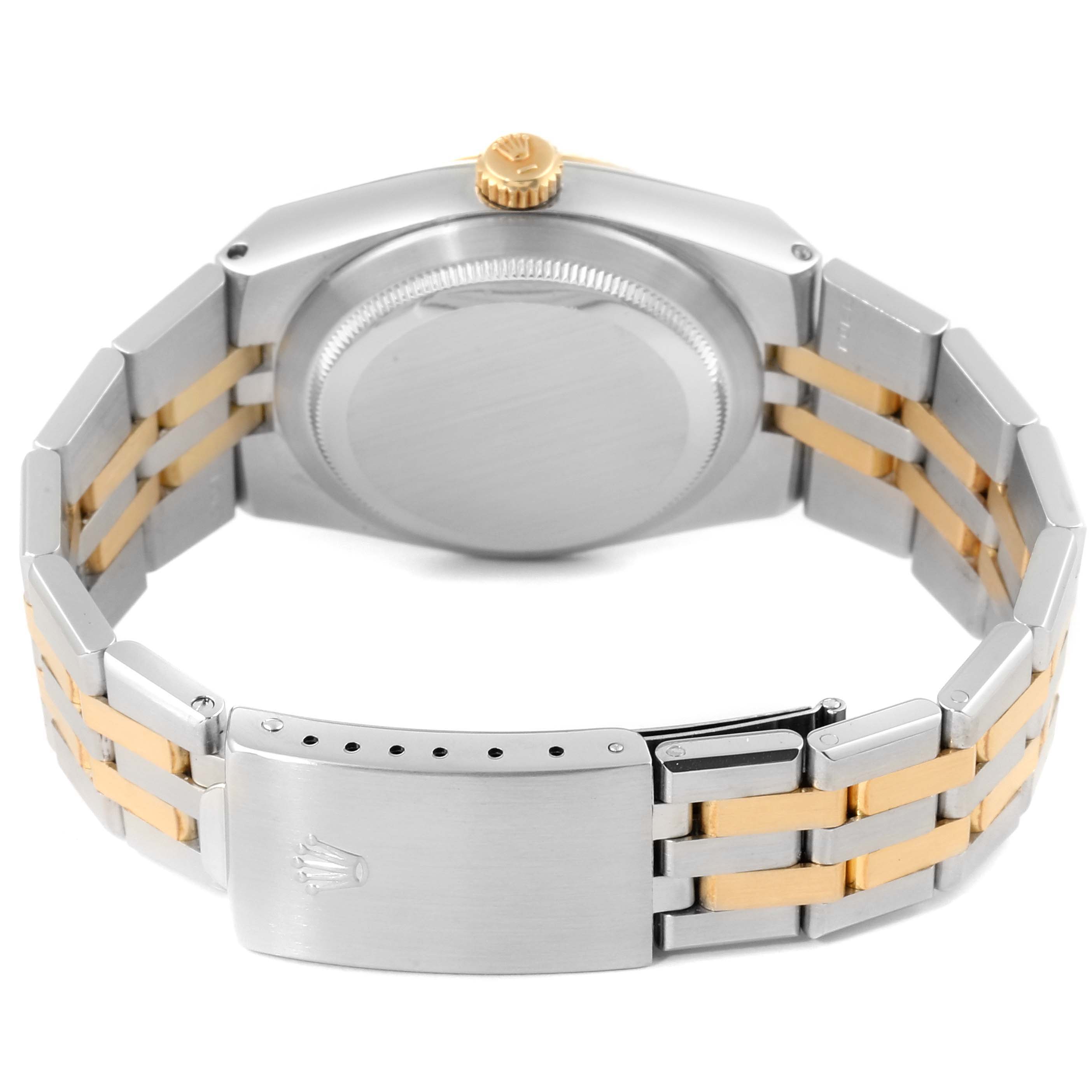 The image shows the backside of a Rolex Oysterquartz 17013 Men's Steel and Gold (two tone) Champagne Dial 17013 Men's Steel and Gold (two tone) Champagne Dial watch including the bracelet, clasp, case back, and the crown.