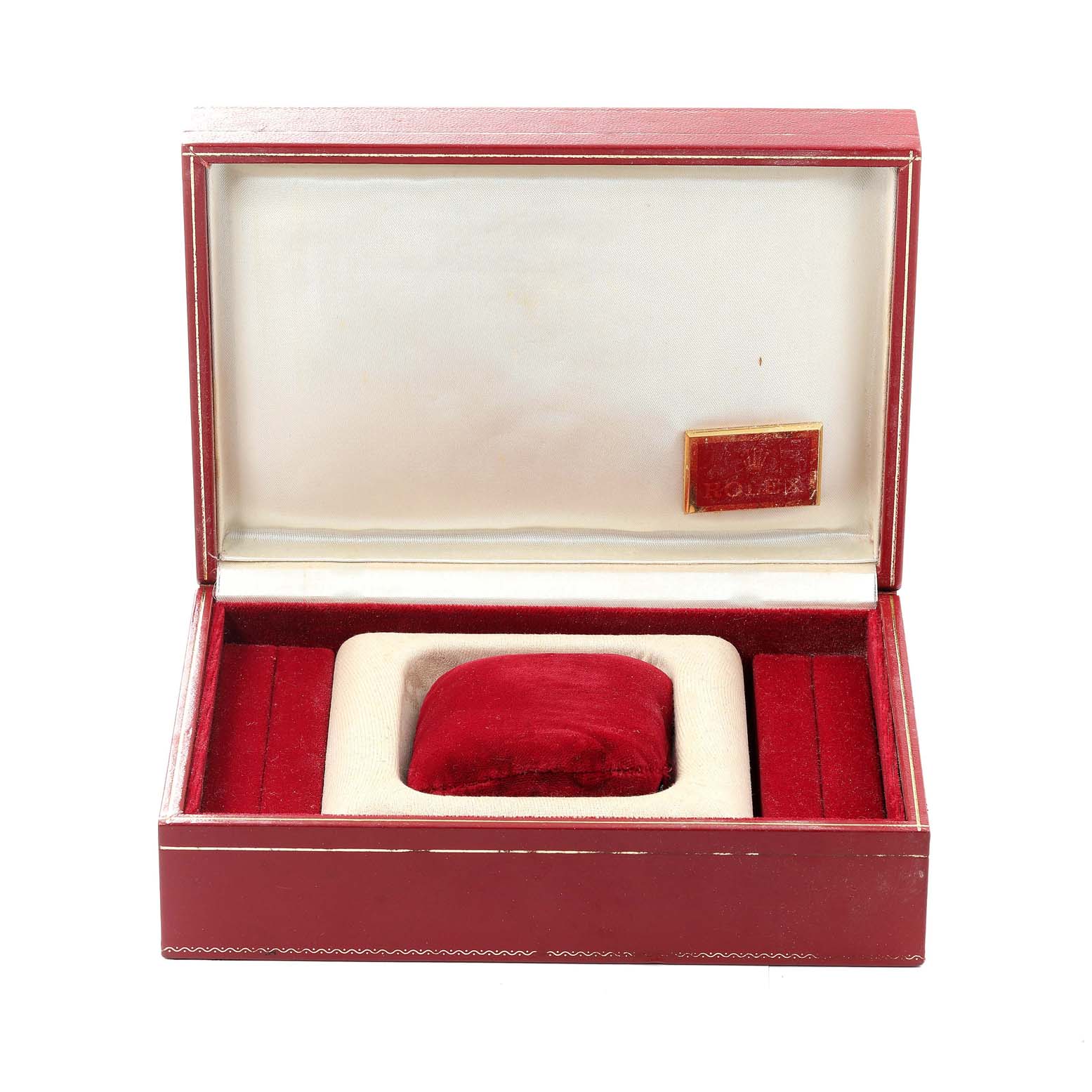 The image shows an open Rolex presentation box for the President model, with a red velvet interior and cushion.