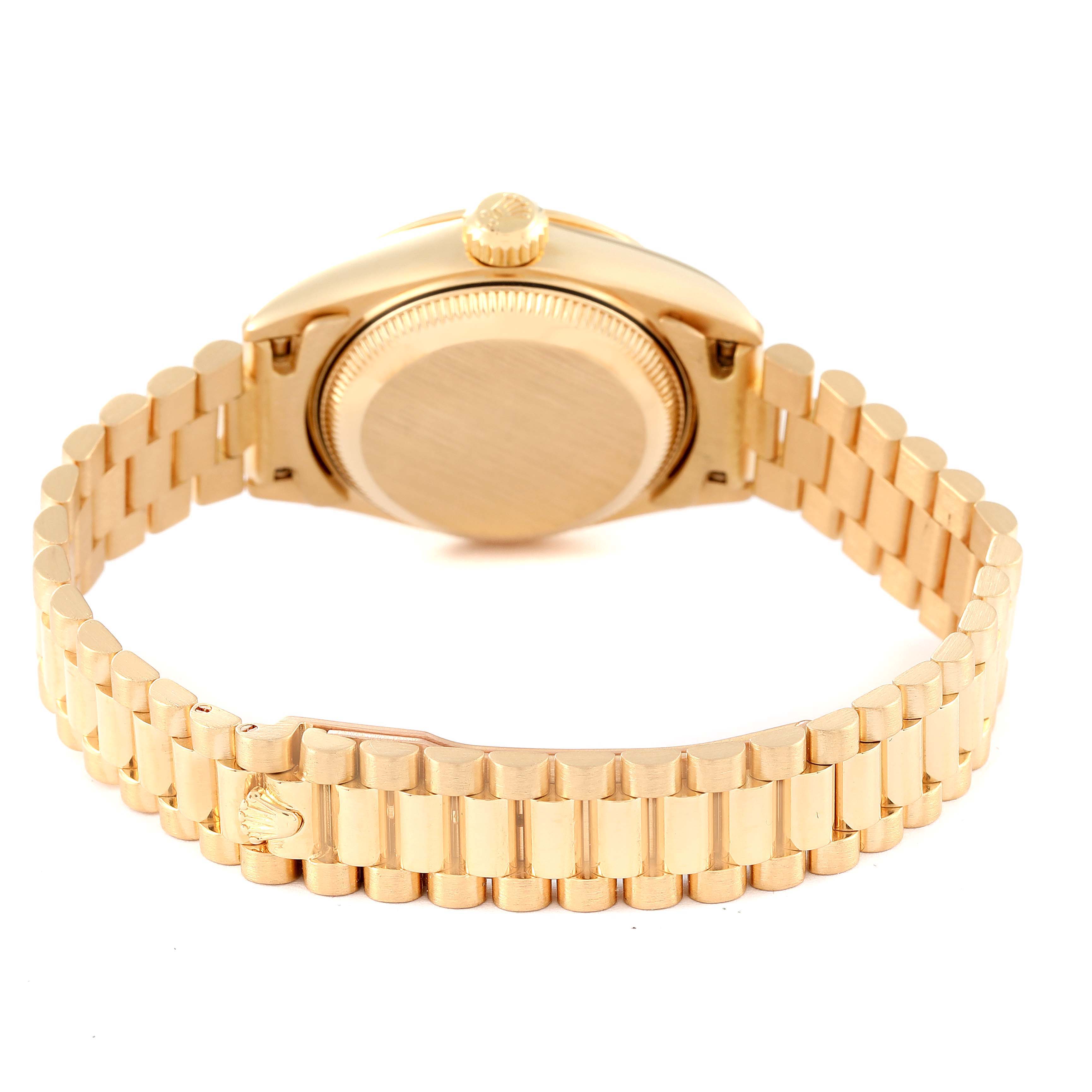 The image shows the back view of a Rolex President 79268 Women
s Yellow Gold Champagne Dial 79268 Women
s Yellow Gold Champagne Dial model watch, highlighting its gold bracelet and case back.