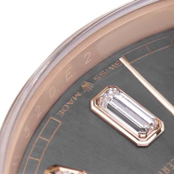 The image shows a close-up of the dial and bezel edge of a Rolex President 128235 Men's Rose Gold Grey Dial watch, highlighting the diamonds and "Swiss Made" text.