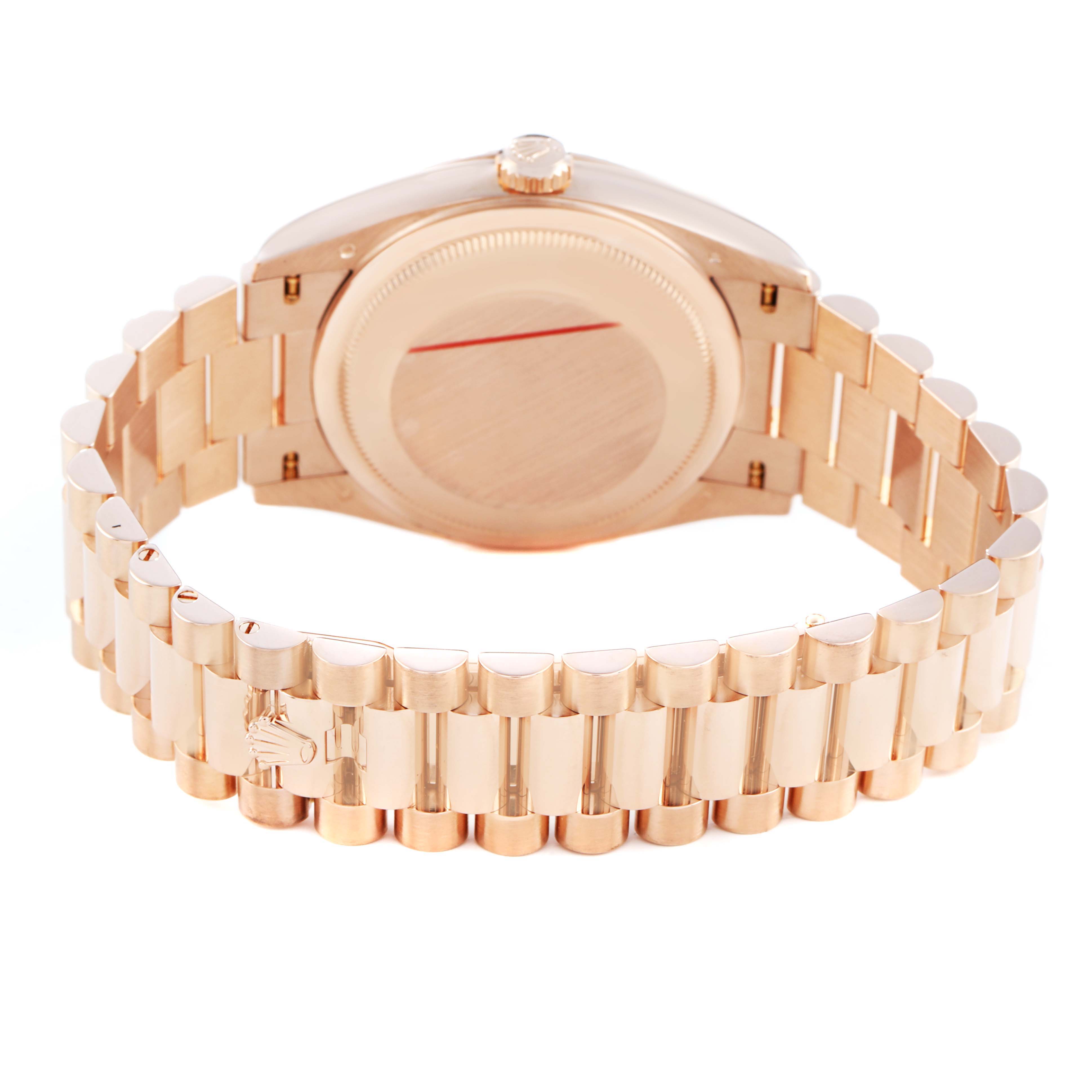 The image shows the back of the Rolex President 128235 Men's Rose Gold Grey Dial model watch, highlighting the case back and the gold bracelet.