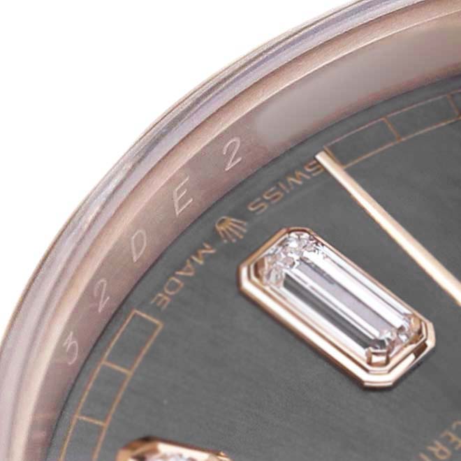 The image shows a close-up of the Rolex President 128235 Men's Rose Gold Grey Dial model dial, highlighting a diamond hour marker, part of the hands, and the "Swiss Made" text.
