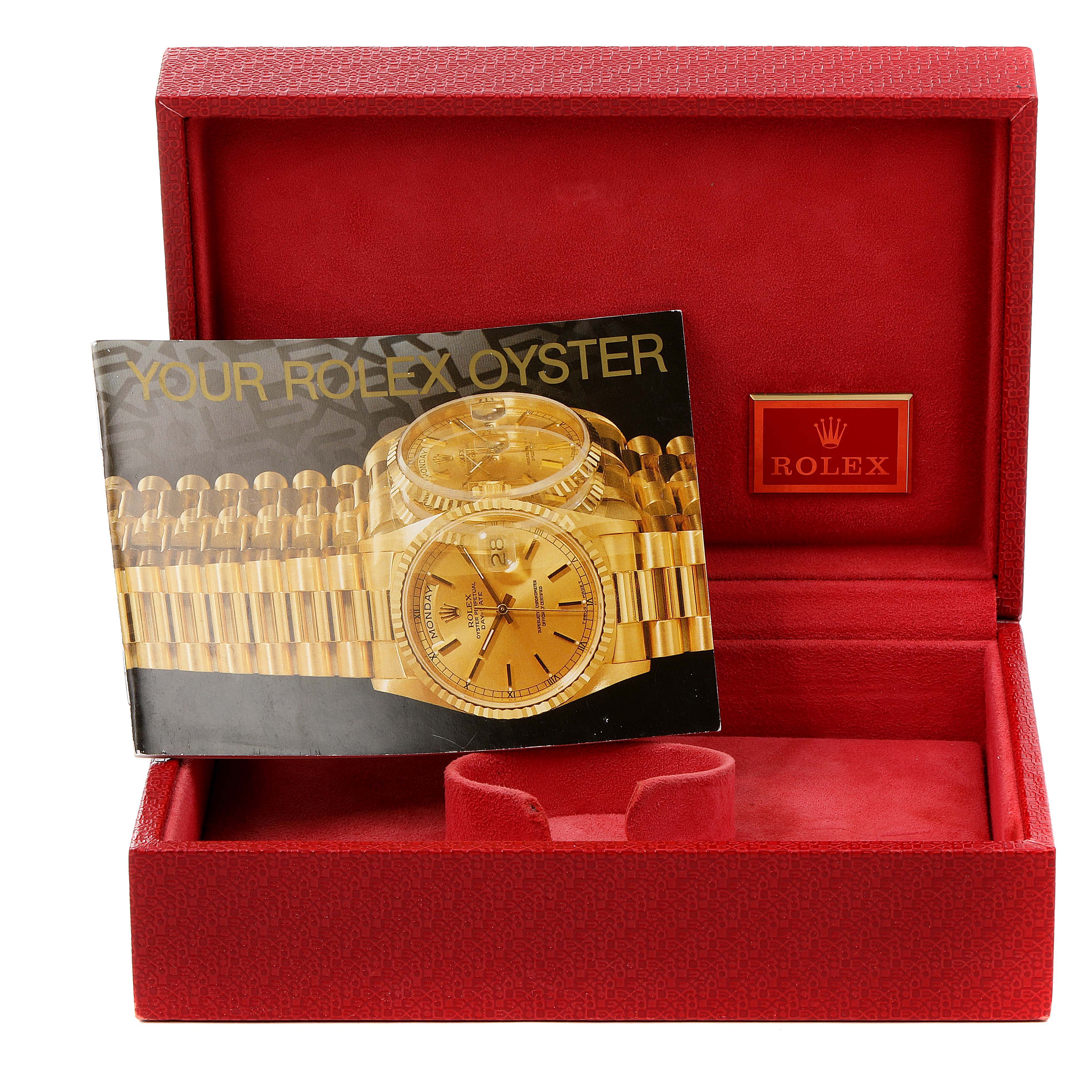 The image shows a red Rolex box containing a catalog for the President model by Rolex.