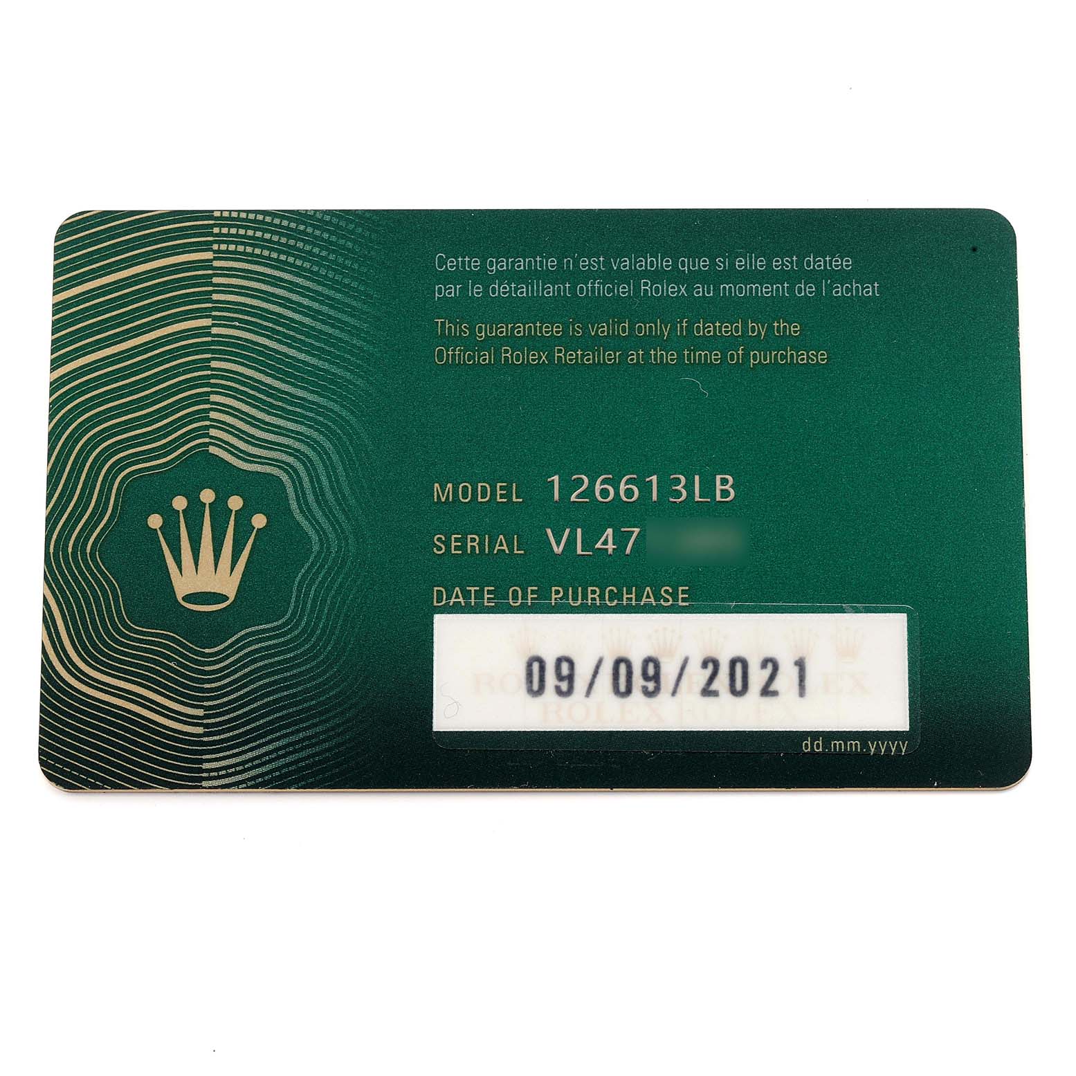 This image shows the guarantee card for a Rolex Submariner 126613LB Men's Steel and Gold (two tone) Blue Dial 126613LB Men's Steel and Gold (two tone) Blue Dial, model 126613LB.