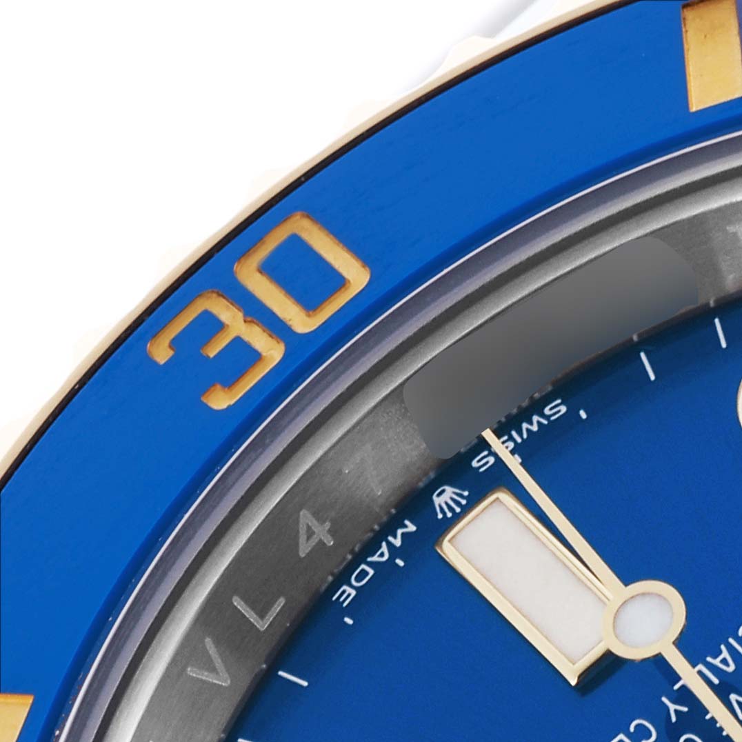 The image shows a close-up of the blue bezel and part of the face of a Rolex Submariner 126613LB Men's Steel and Gold (two tone) Blue Dial 126613LB Men's Steel and Gold (two tone) Blue Dial watch, highlighting the "30" marker.