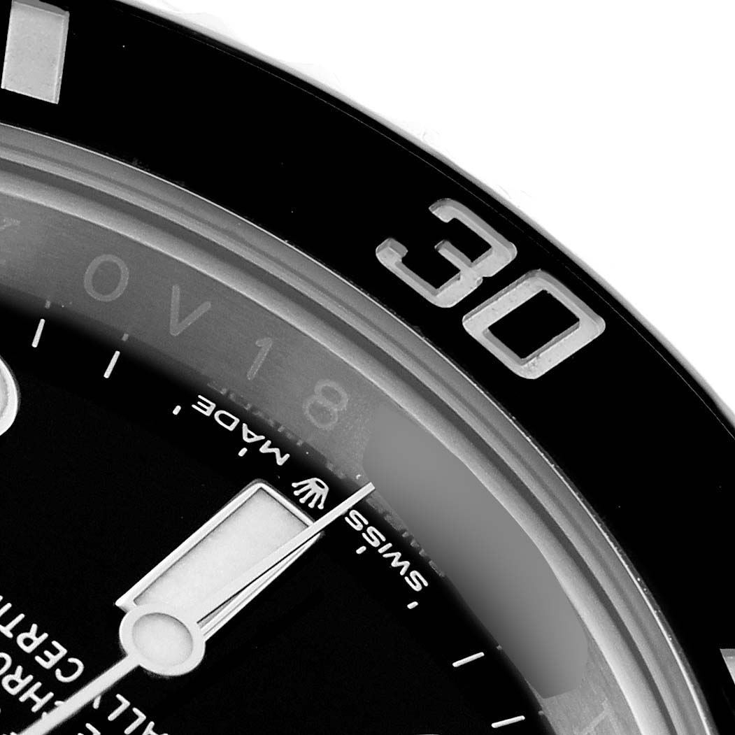 The image shows a close-up of the bezel and dial of a Rolex Submariner 126610LN Men's Stainless Steel Black Dial, highlighting the "30" bezel marking and part of the dial.