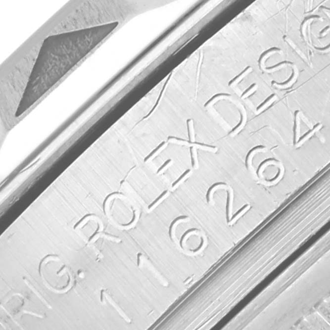 The image shows a close-up of the engraved side of a Rolex Turn-o-Graph 116264 Men's Stainless Steel White Dial 116264 Men's Stainless Steel White Dial watch case, highlighting the model's details.