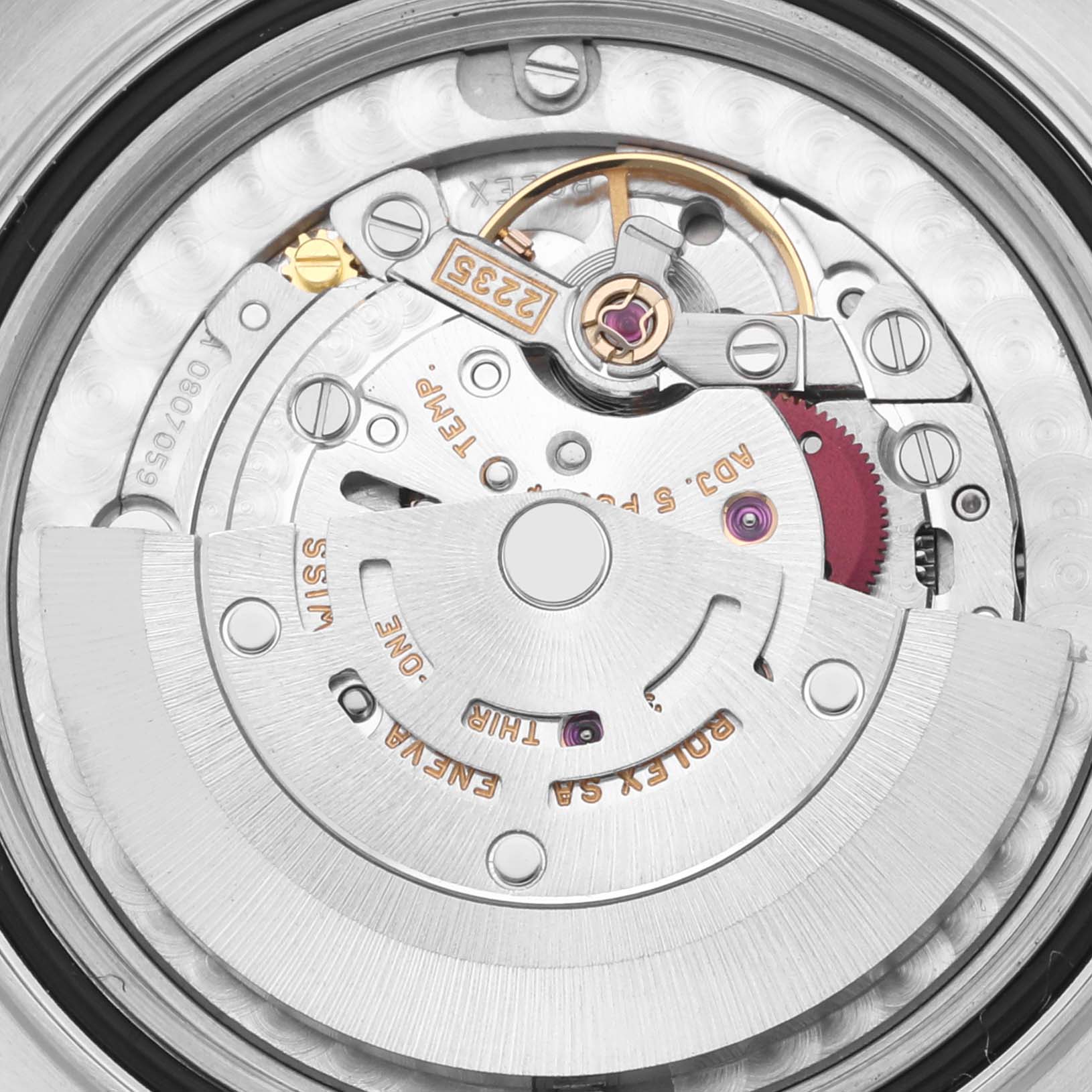 The image shows the Rolex Yacht-Master 168623 Men
s Steel and Gold (two tone) White Dial 168623 Men
s Steel and Gold (two tone) White Dial watch movement from a top-down angle, highlighting the rotor and intricate components.