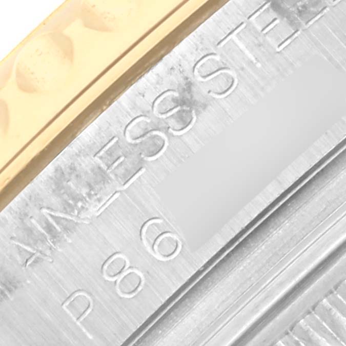 The image shows a close-up of the bezel and part of the stainless steel case of a Rolex Yacht-Master 168623 Men
s Steel and Gold (two tone) White Dial 168623 Men
s Steel and Gold (two tone) White Dial watch.