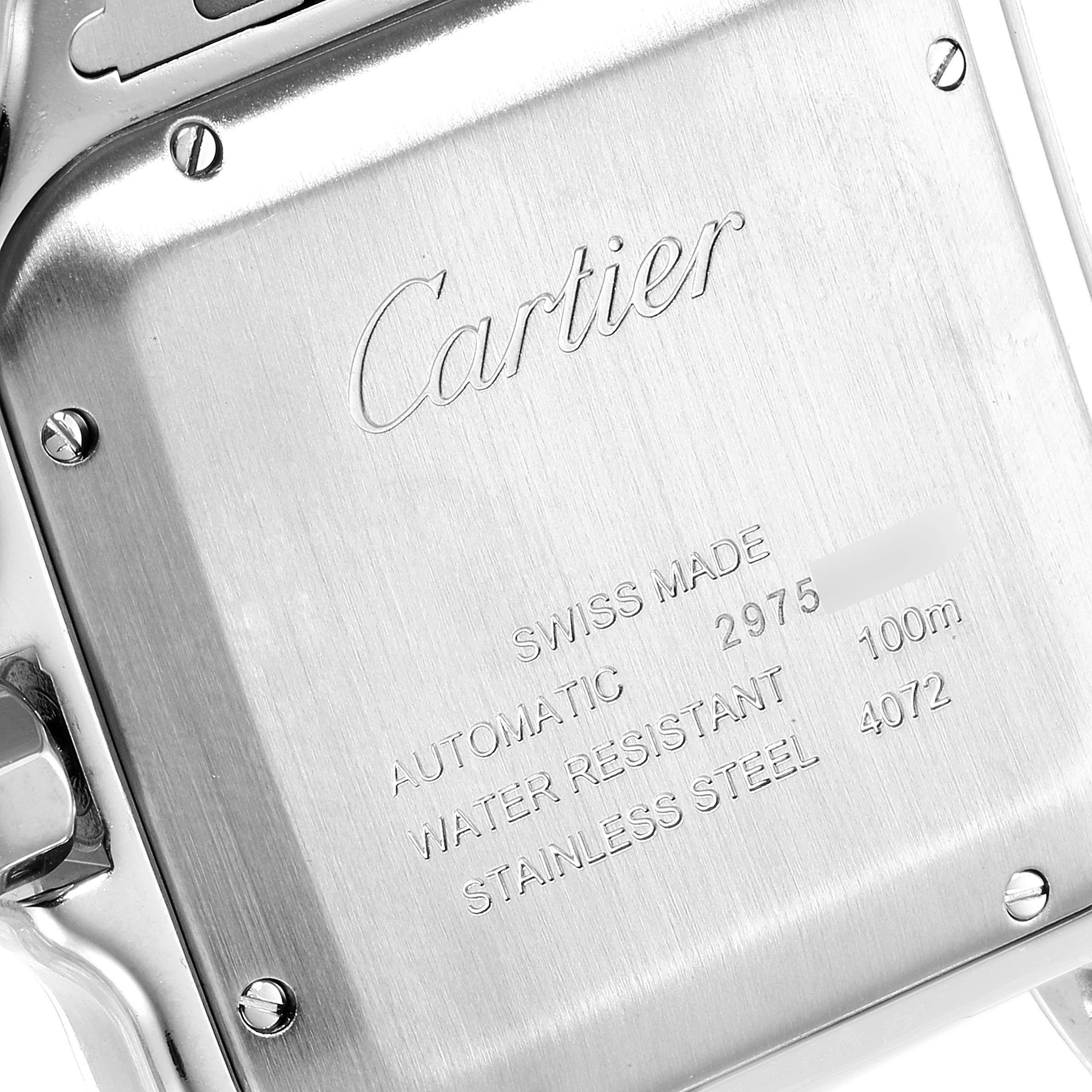 The image shows the back case of a Santos model watch by Cartier, highlighting details like water resistance and material.