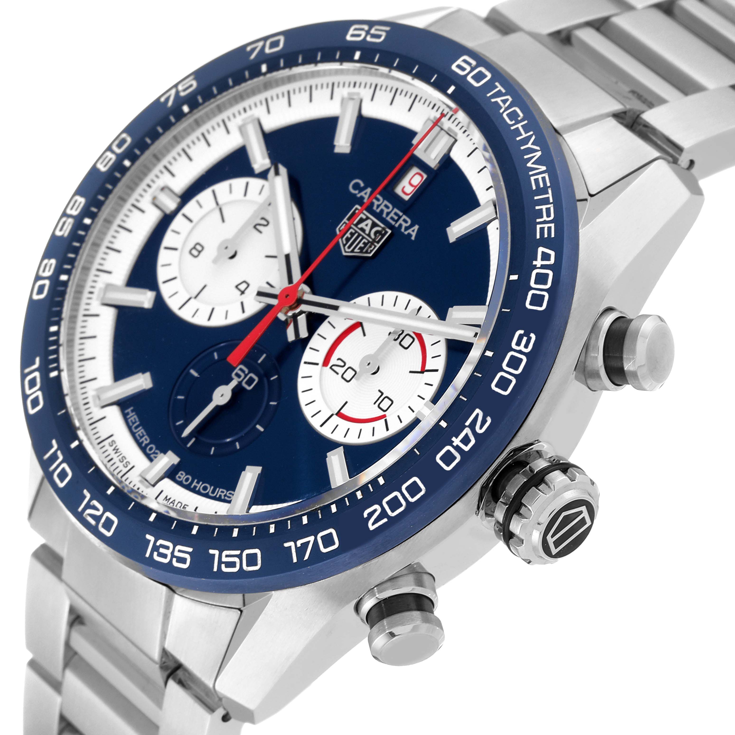 This image shows a close-up side angle of a Tag Heuer Carrera CBN2A1E.BA0643 Men
s Stainless Steel Blue Dial CBN2A1E.BA0643 Men
s Stainless Steel Blue Dial watch, highlighting the dial, tachymeter bezel, and stainless steel bracelet.