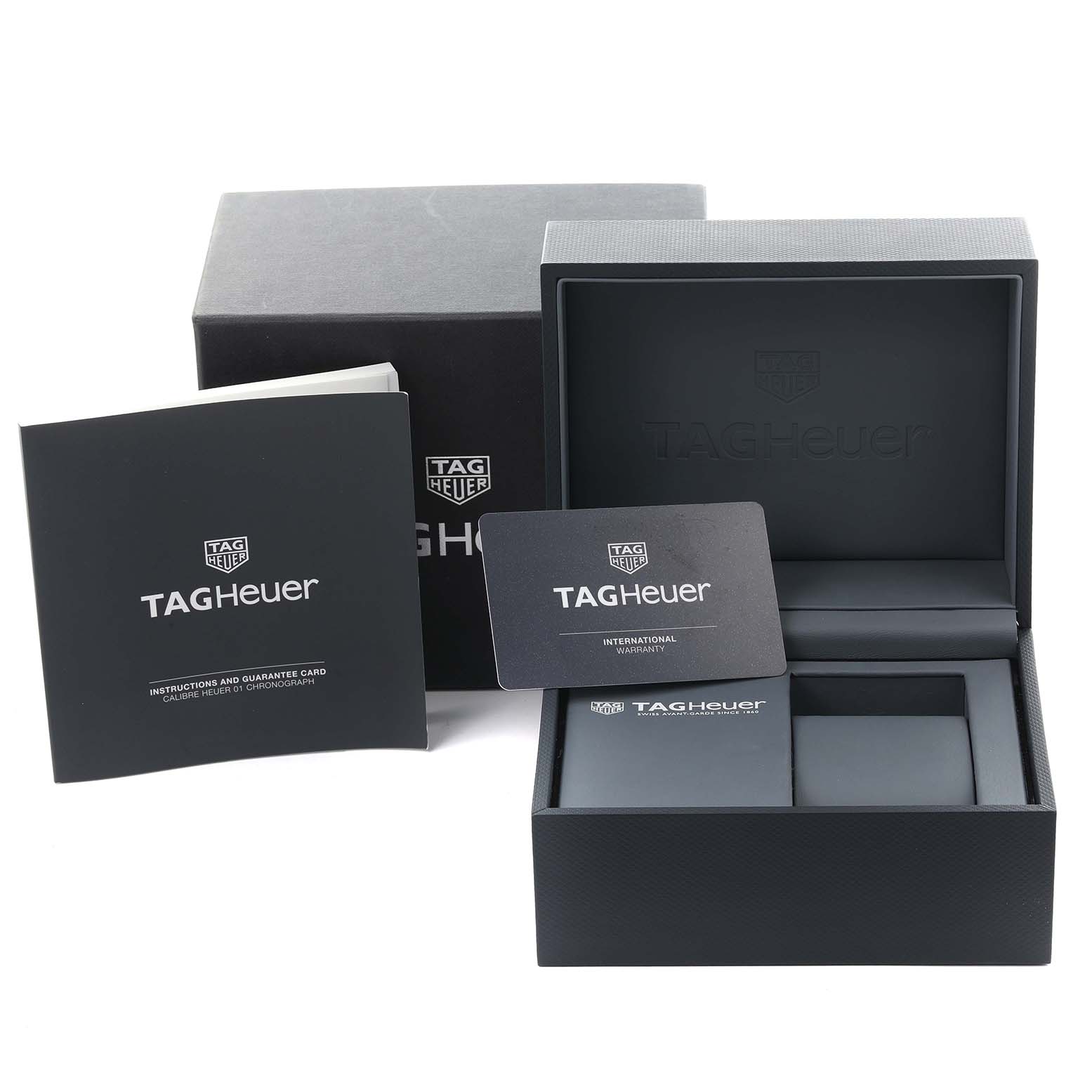 The image shows the Tag Heuer Carrera CAR2A90.FT6071 Men's Ceramic Black Dial CAR2A90.FT6071 Men's Ceramic Black Dial package, including the box, warranty card, and instruction booklet, from a front angle.