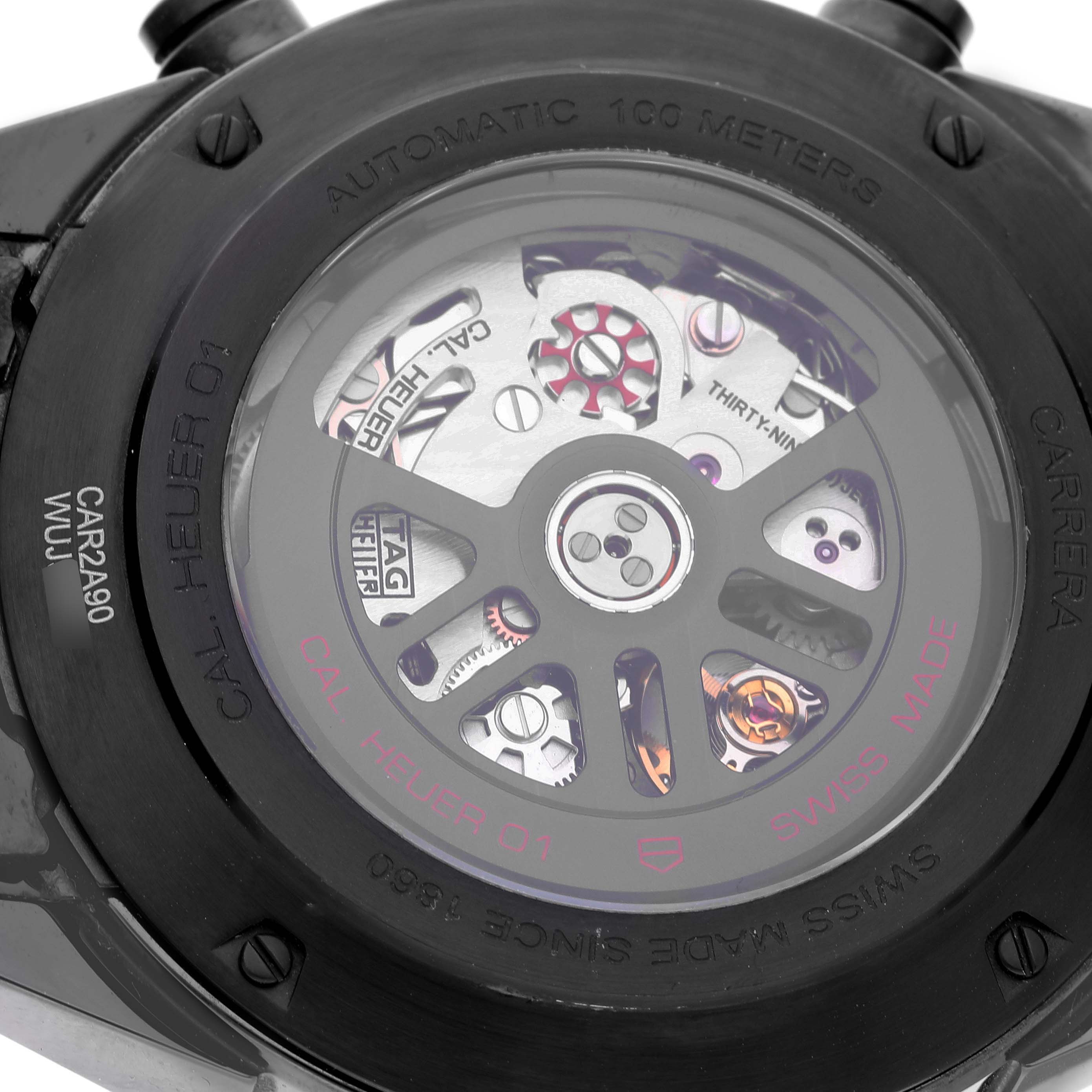 The image shows the back view of a Tag Heuer Carrera CAR2A90.FT6071 Men's Ceramic Black Dial CAR2A90.FT6071 Men's Ceramic Black Dial watch, highlighting its automatic movement and internal components.