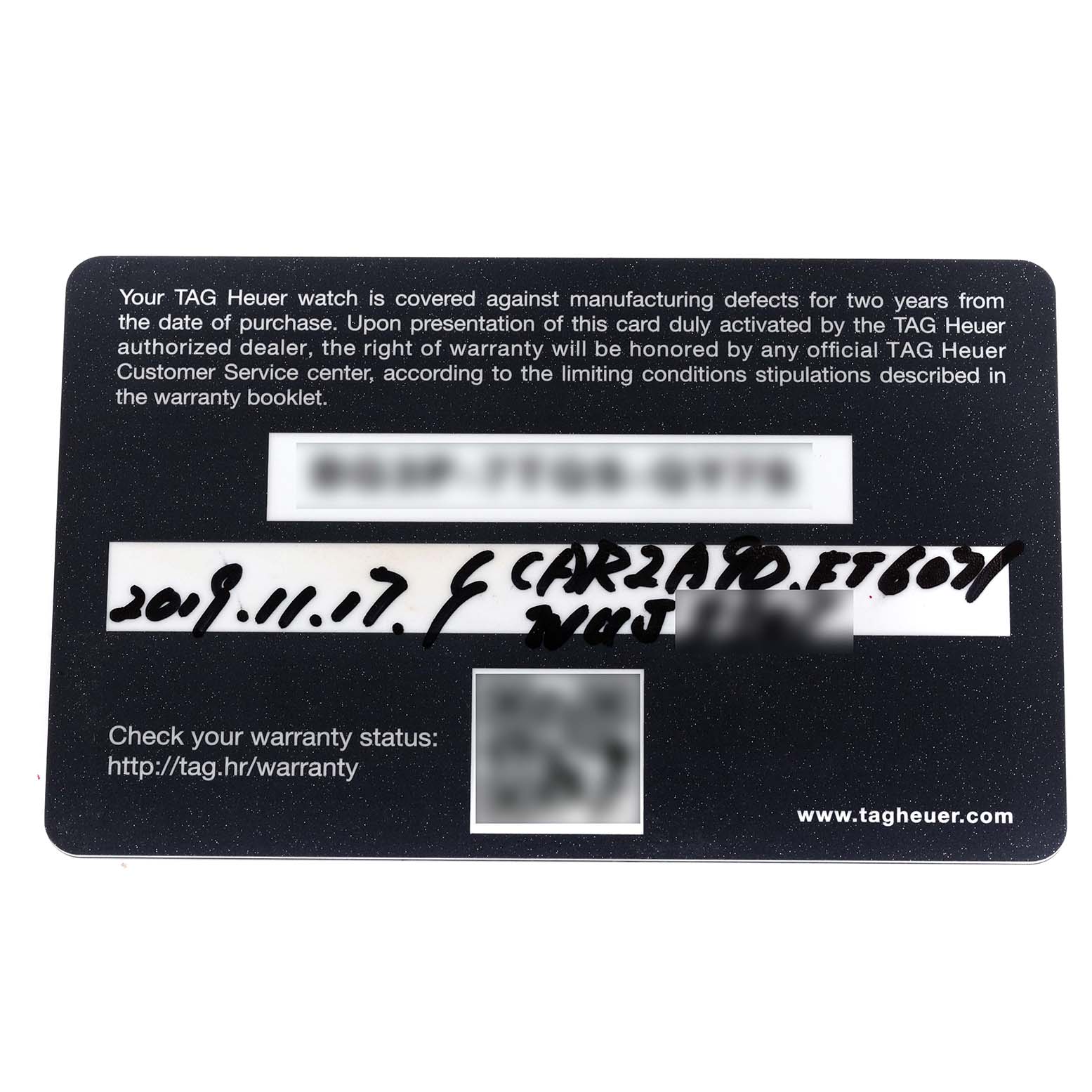The image shows a warranty card for the Tag Heuer Carrera CAR2A90.FT6071 Men's Ceramic Black Dial CAR2A90.FT6071 Men's Ceramic Black Dial model, displaying text and handwritten details.