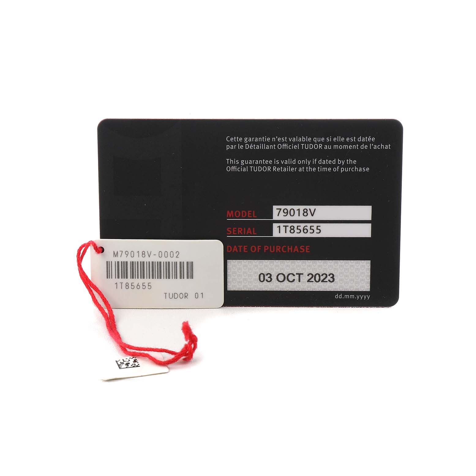 The image shows the warranty card and tag for the Tudor Heritage Black Bay M79018V-0001 Men's Yellow Gold Green Dial model.