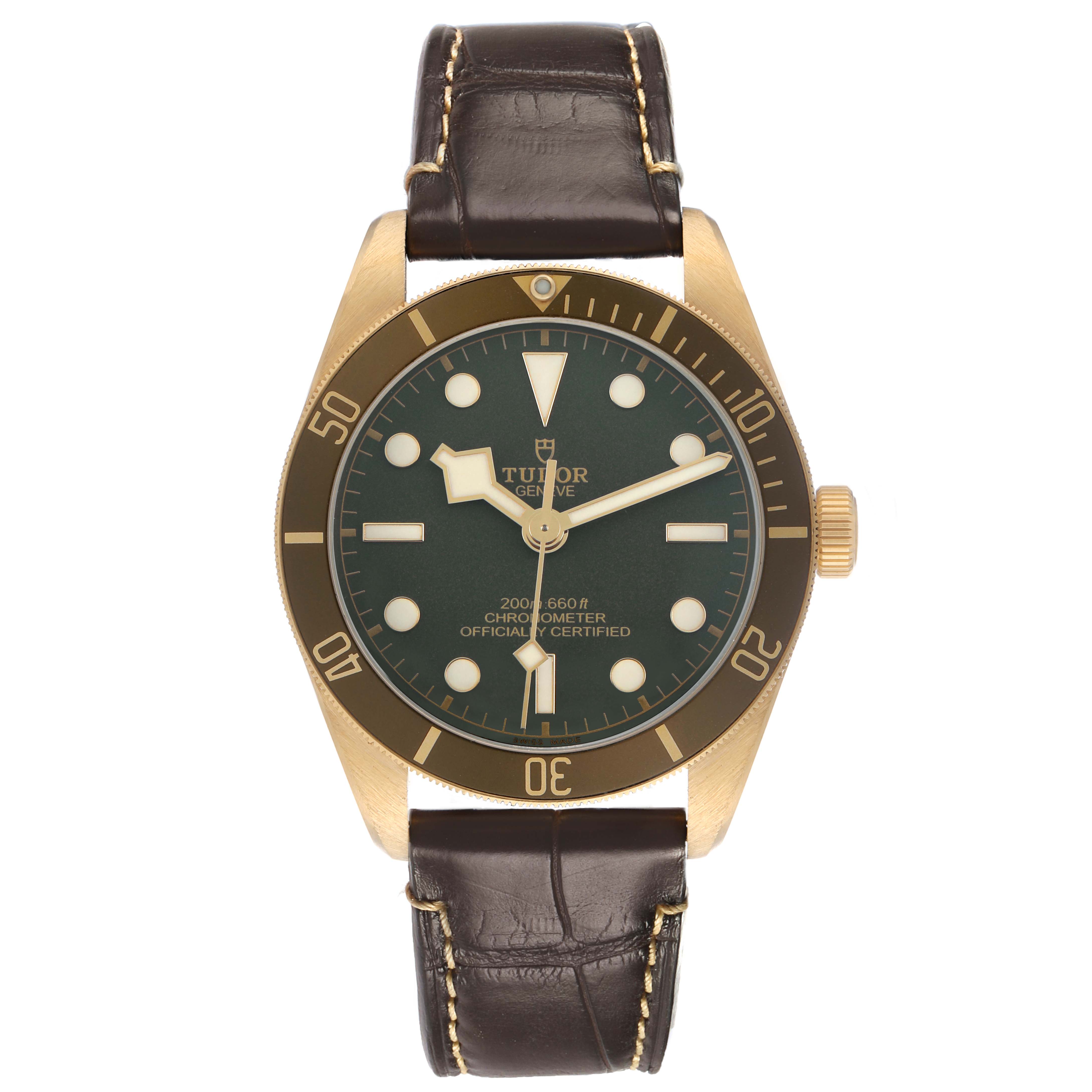 The Tudor Heritage Black Bay M79018V-0001 Men's Yellow Gold Green Dial watch is shown from a front view, displaying the dial, bezel, and leather strap.