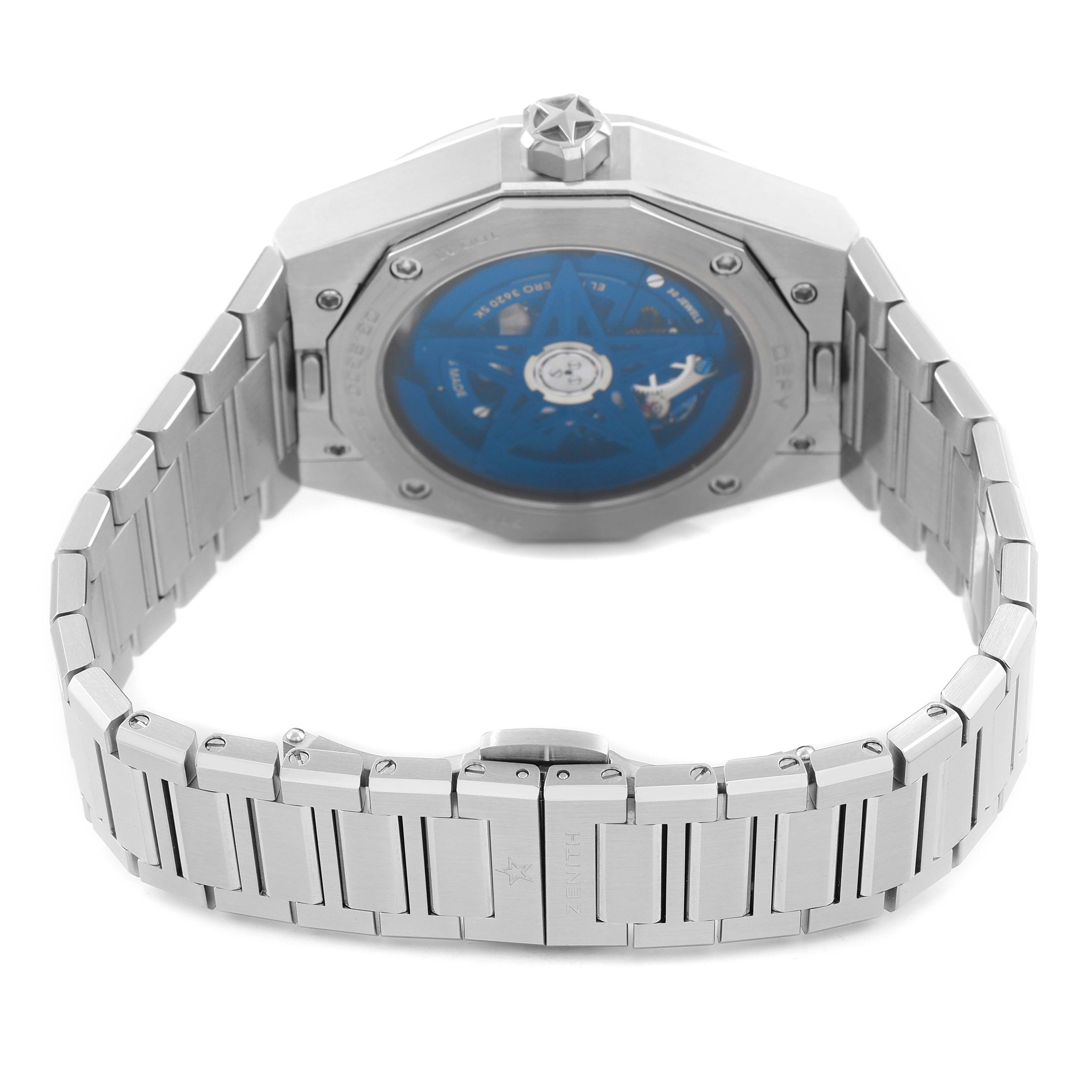 The image shows the back view of the Zenith Defy 03.9300.3620 Men's Stainless Steel Blue Dial watch, highlighting the exhibition case back and bracelet.