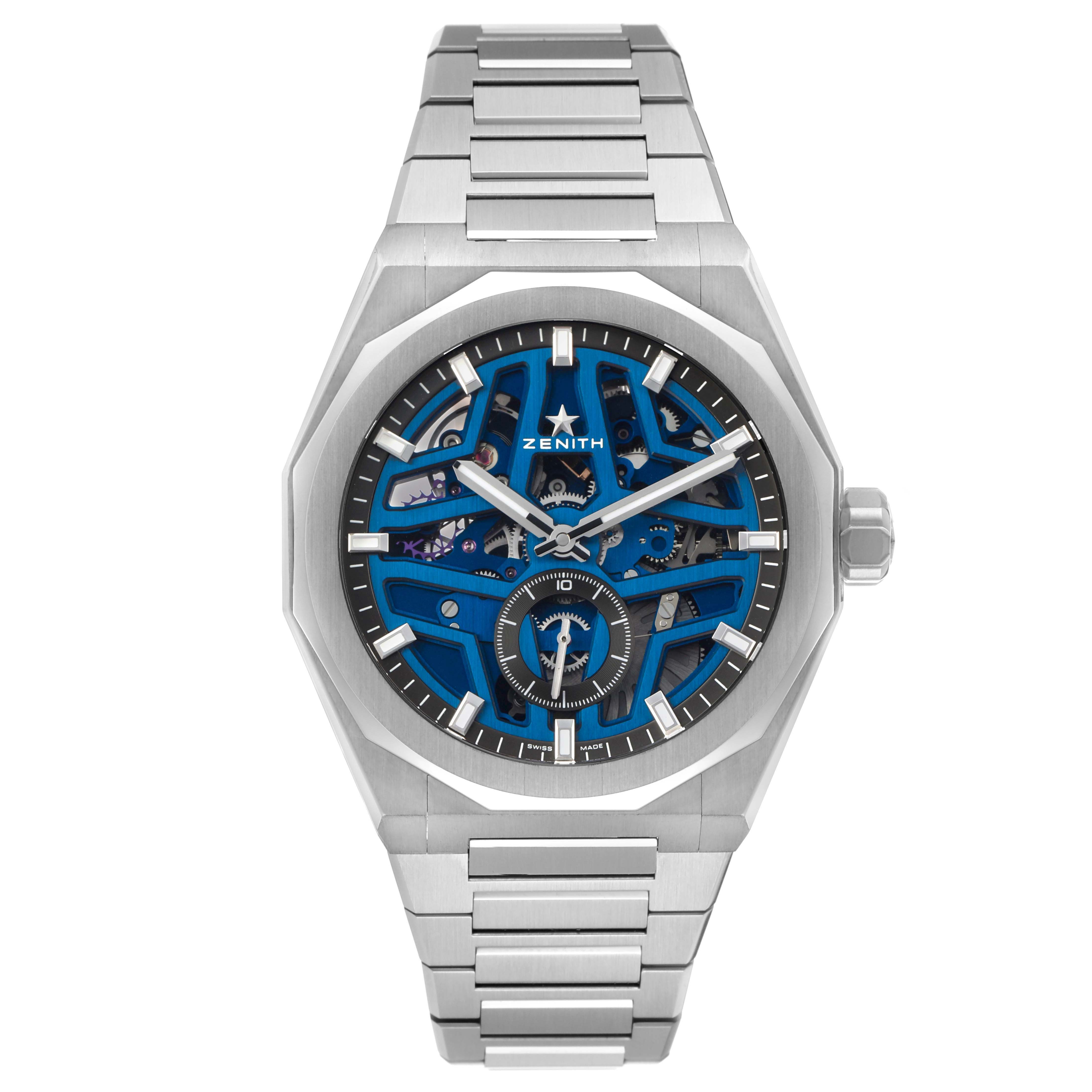 The image shows a front view of the Zenith Defy 03.9300.3620 Men's Stainless Steel Blue Dial watch, highlighting its dial, case, and bracelet.