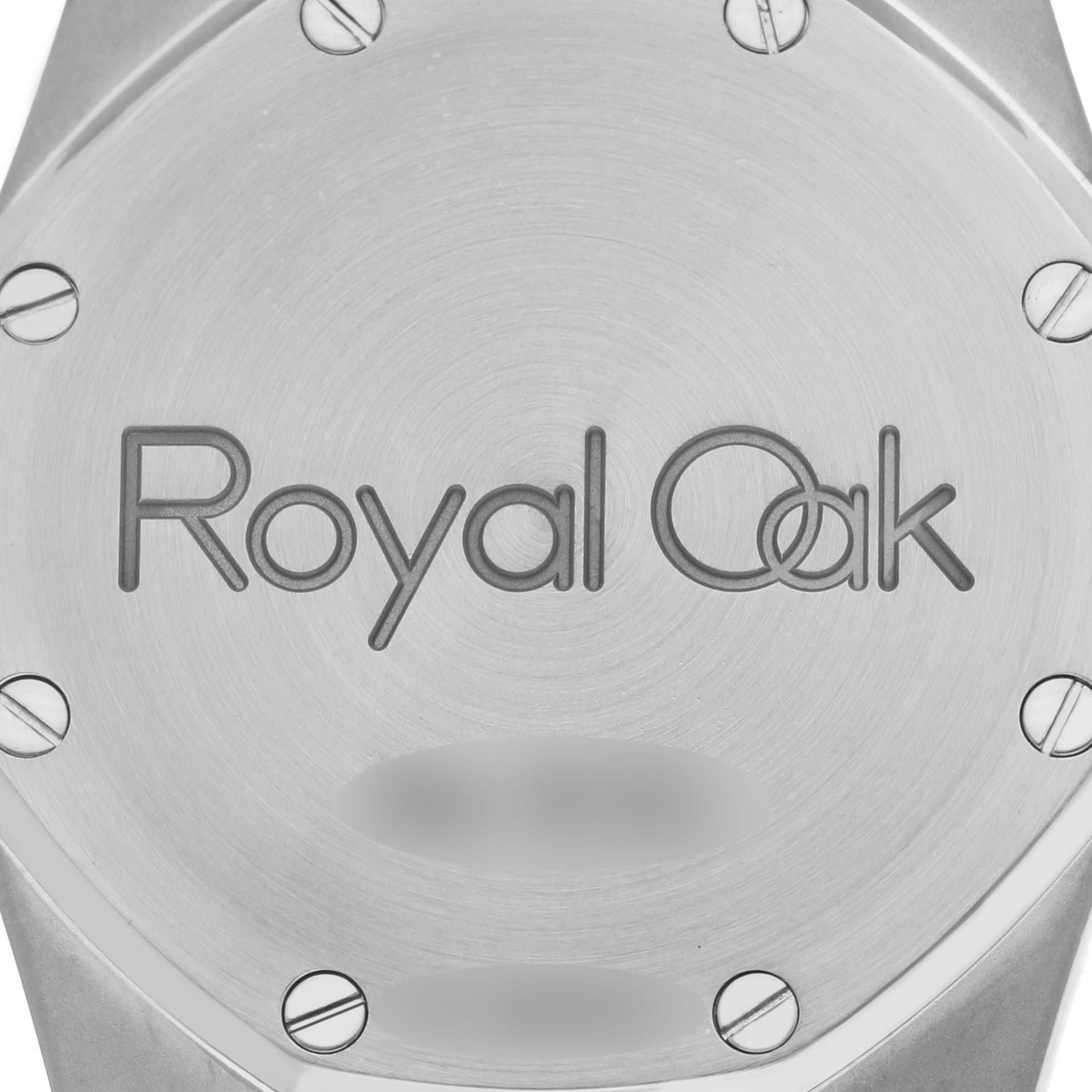 The image shows the case back of the Audemars Piguet Royal Oak 15000SA/O/0789SA/07 Men's Steel and Gold (two tone) White Dial 15000SA/O/0789SA/07 Men's Steel and Gold (two tone) White Dial, featuring the engraved logo and visible screws.