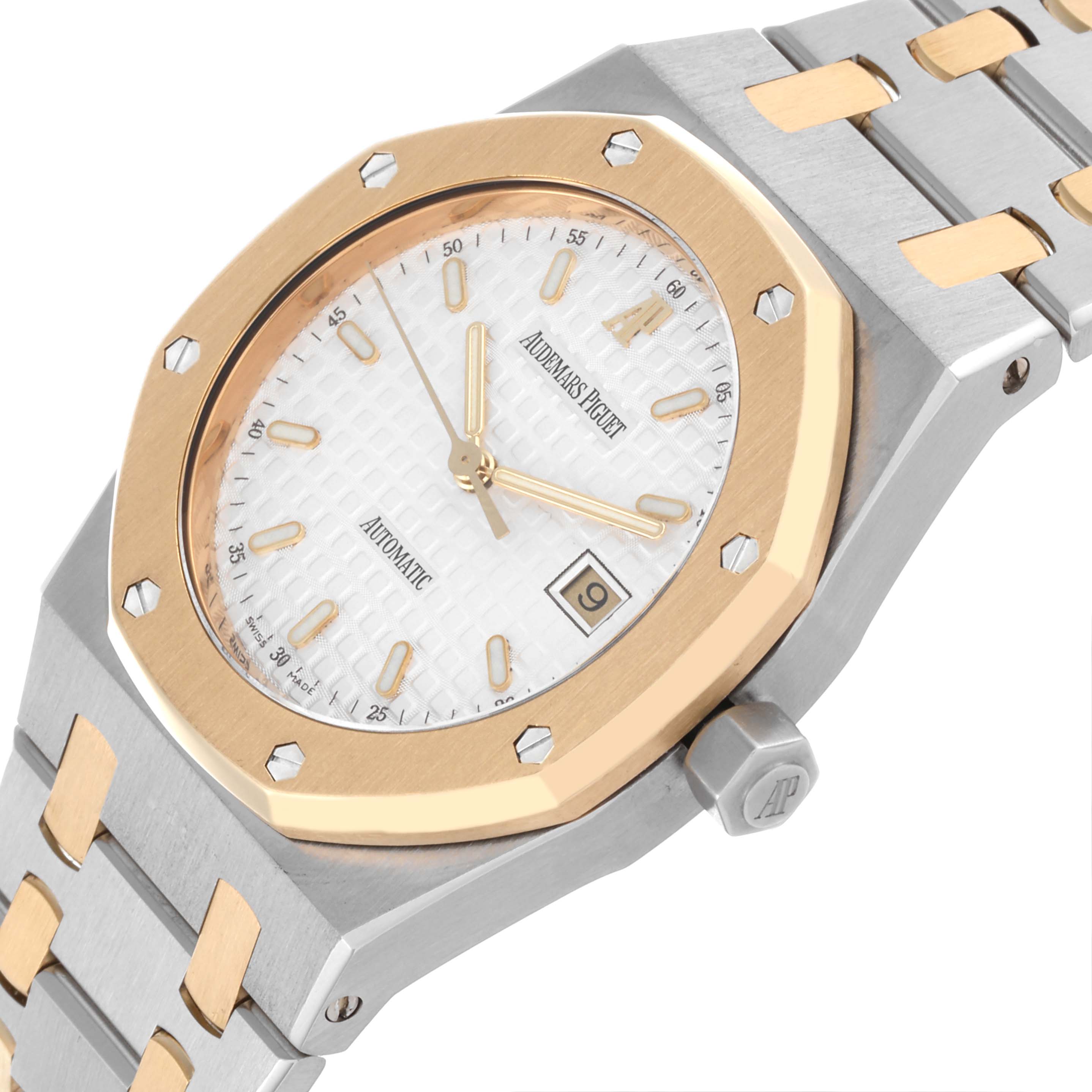 The image shows the Audemars Piguet Royal Oak 15000SA/O/0789SA/07 Men's Steel and Gold (two tone) White Dial 15000SA/O/0789SA/07 Men's Steel and Gold (two tone) White Dial at a slight angle, highlighting the bezel, dial, crown, and part of the bracelet.
