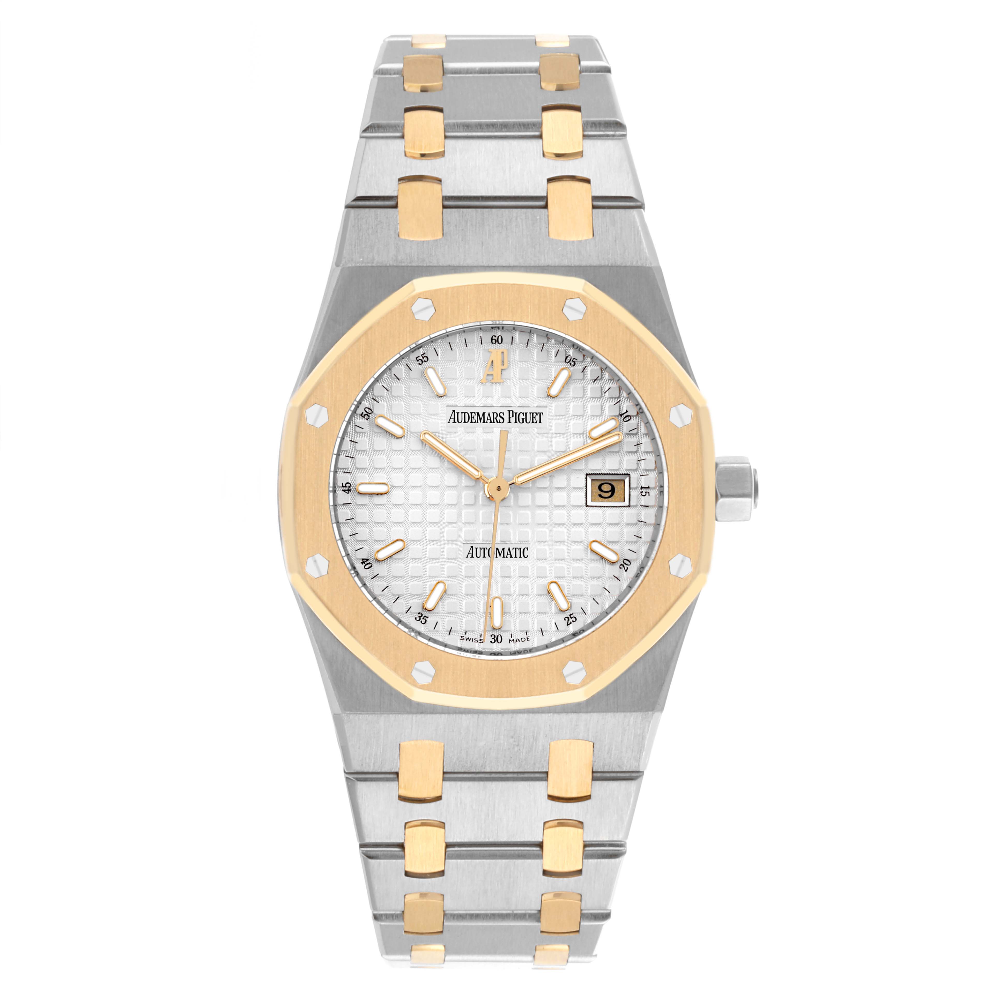 The Audemars Piguet Royal Oak 15000SA/O/0789SA/07 Men's Steel and Gold (two tone) White Dial 15000SA/O/0789SA/07 Men's Steel and Gold (two tone) White Dial watch is shown from a front angle, highlighting its gold and steel bracelet and octagonal bezel.