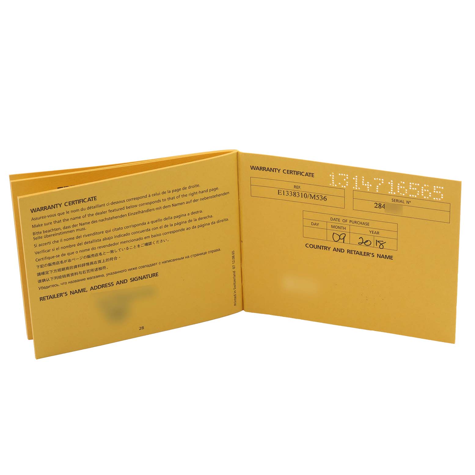 The image shows an open warranty certificate booklet for a Breitling Avenger E1338310/M536-109W Men's Titanium Grey Dial E1338310/M536-109W Men's Titanium Grey Dial watch.