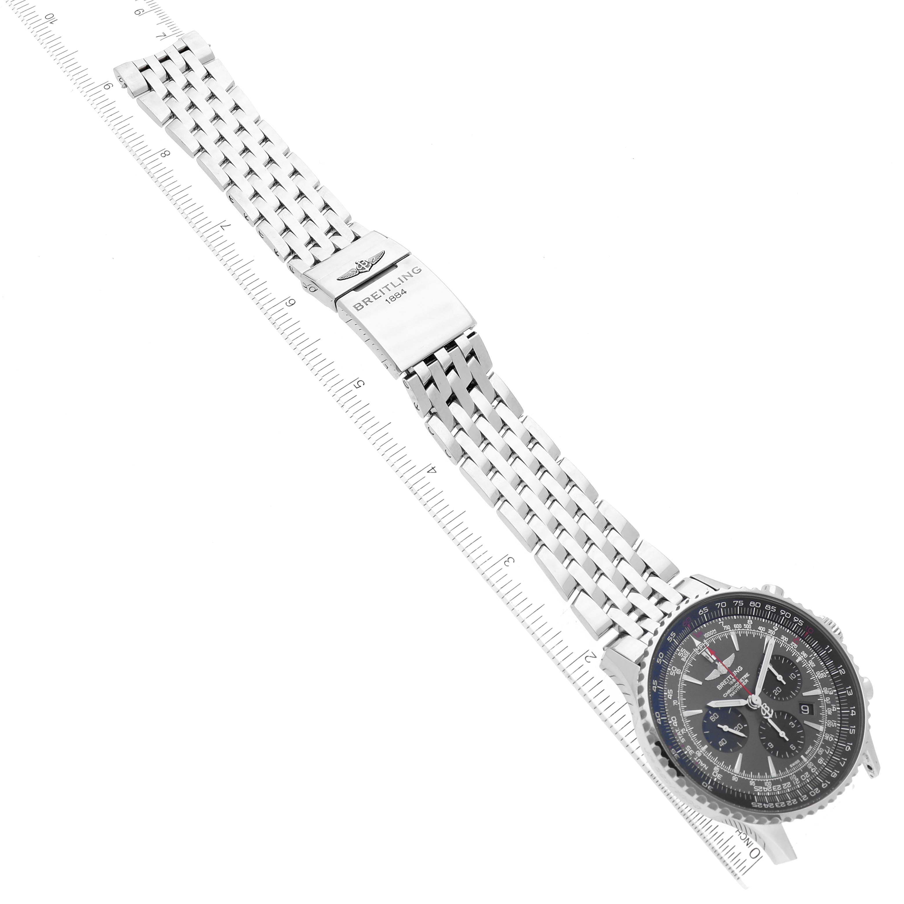 The image shows a top-down view of a Breitling Limited Series watch including the face, stainless steel bracelet, and clasp.