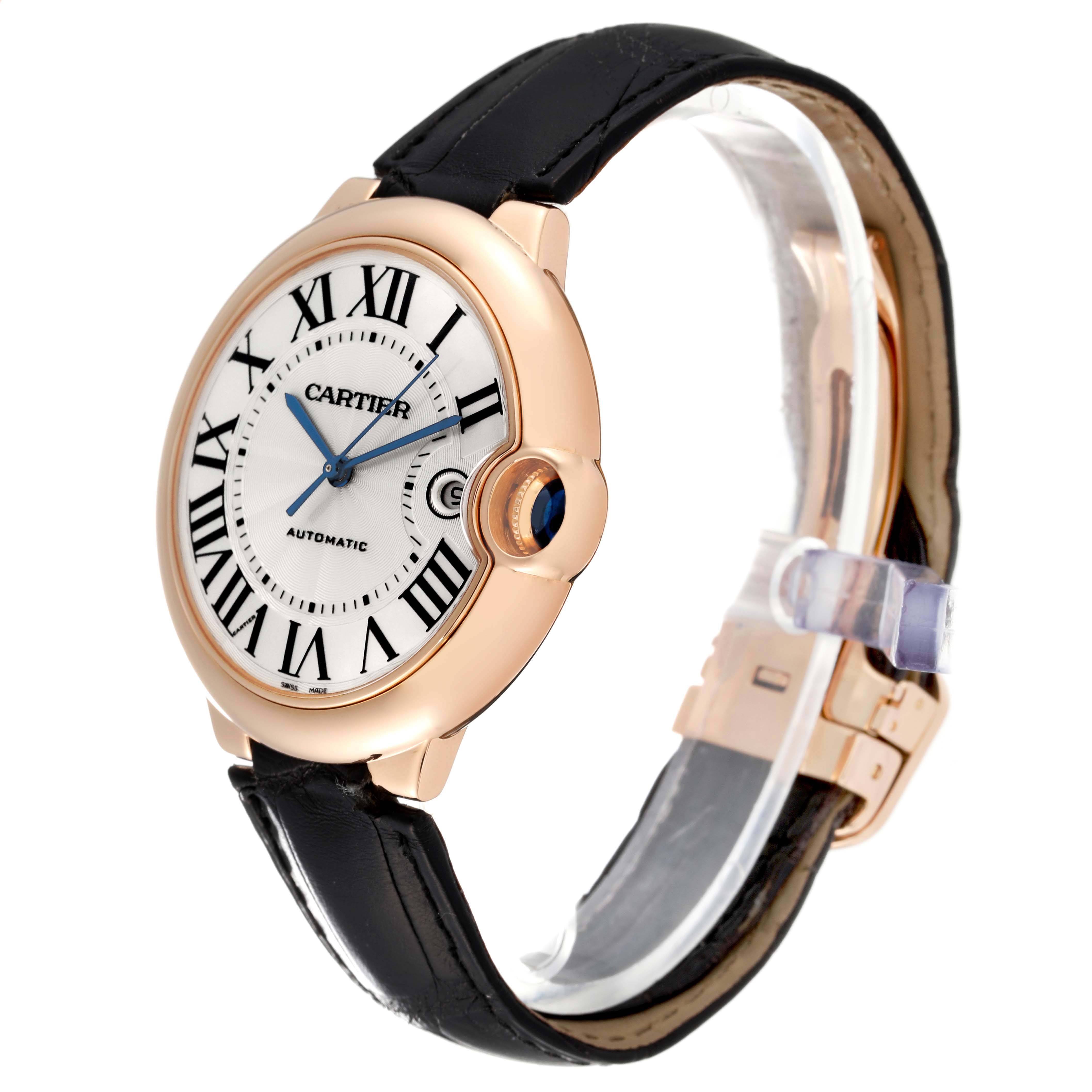 The Cartier Ballon Bleu W6900651 Men's Rose Gold Silver Dial watch is shown at a three-quarter angle, highlighting its round case, Roman numeral dial, and leather strap.