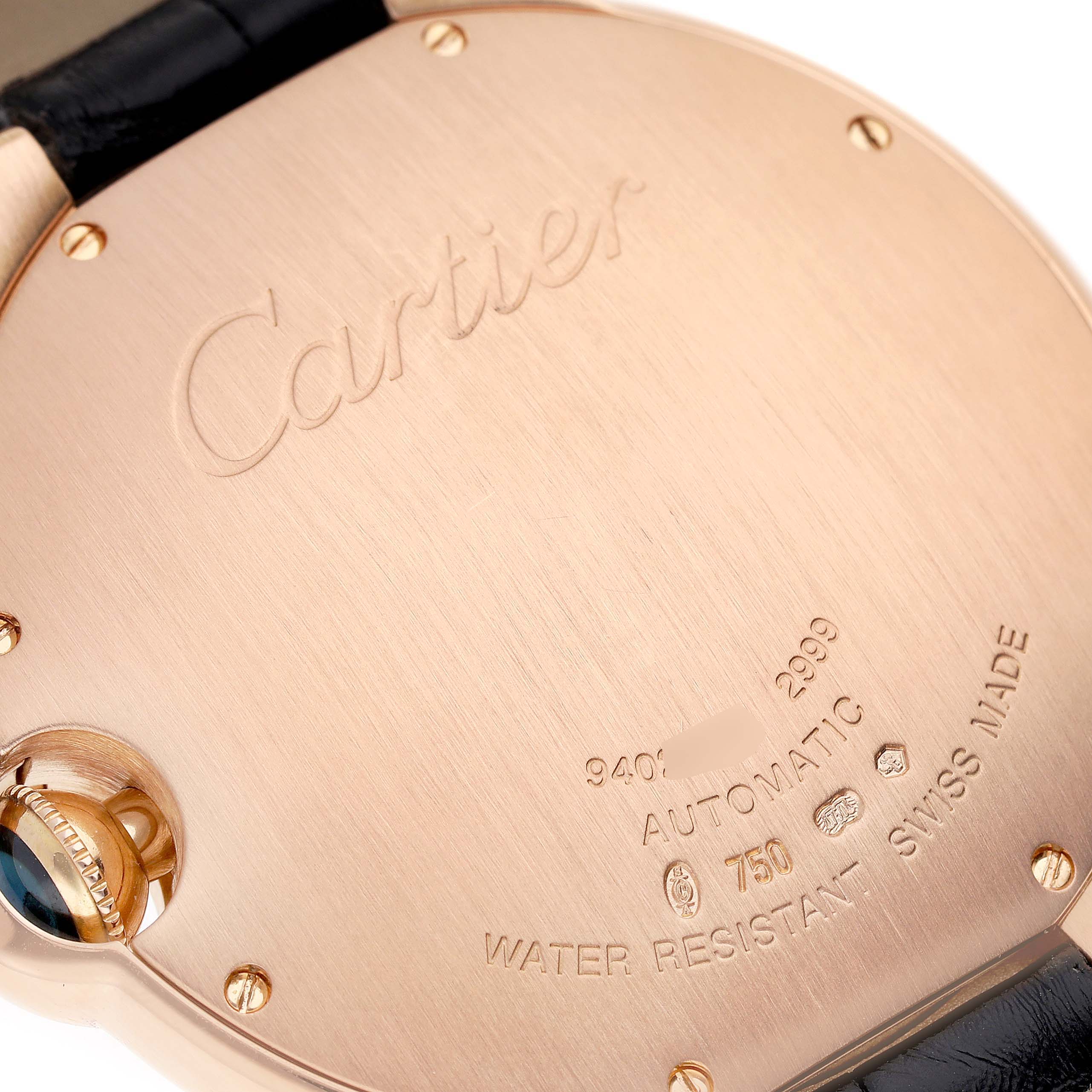 The image shows the back case and part of the strap of a Ballon Bleu by Cartier watch.