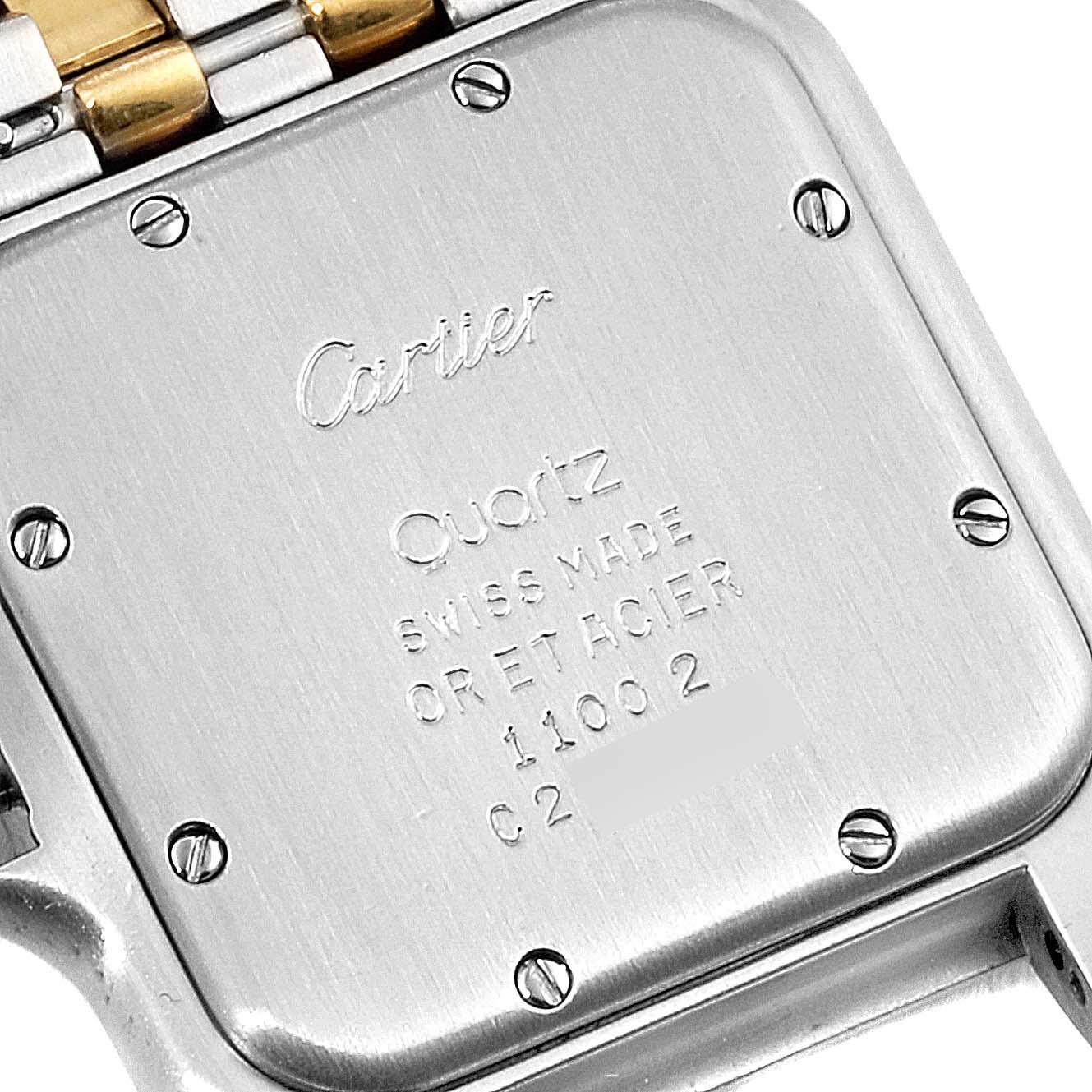 The image shows the back case of a Cartier Panthere W25028B8 Men
s Steel and Gold (two tone) Silver Dial W25028B8 Men
s Steel and Gold (two tone) Silver Dial model watch, highlighting the screws and engraved details.