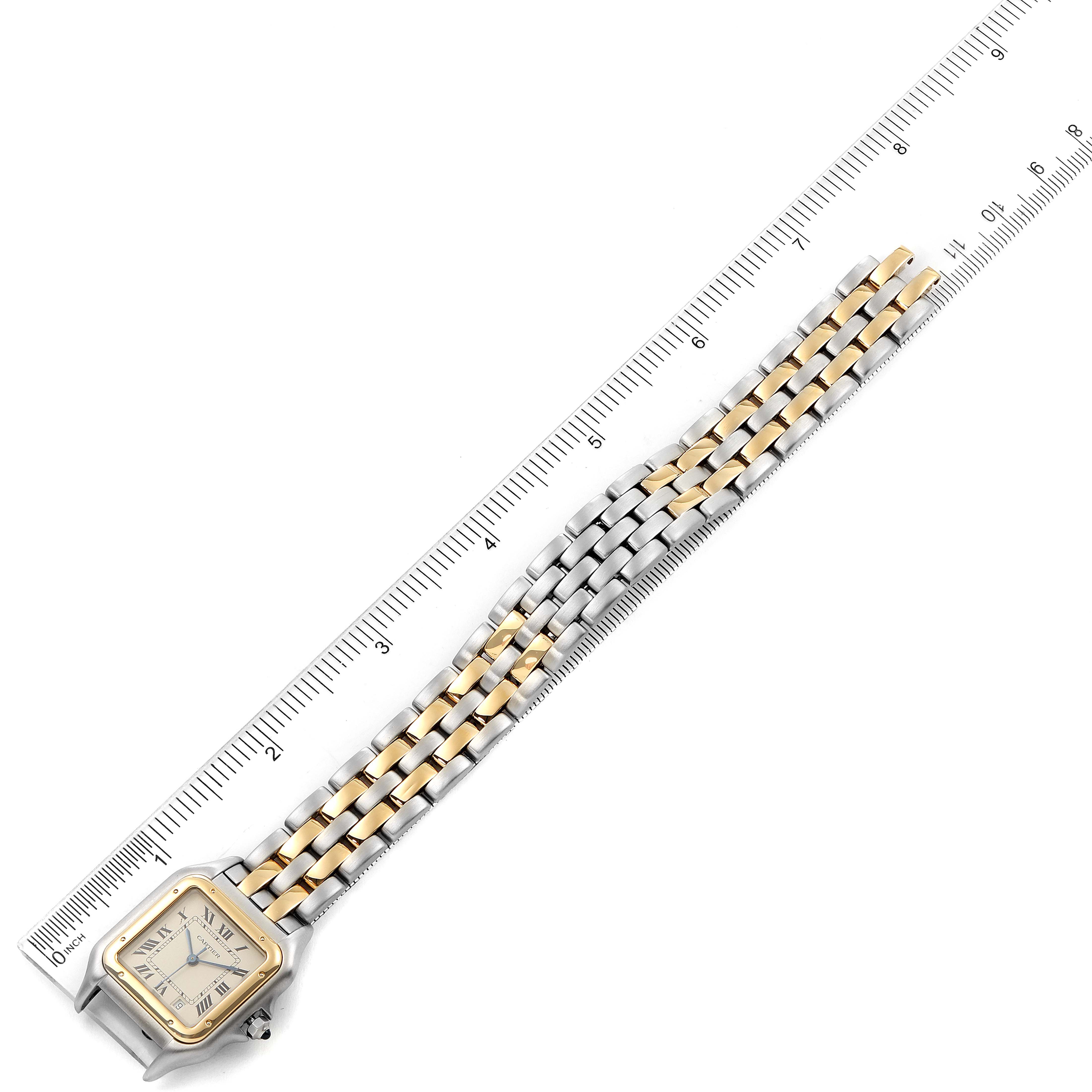 The image shows a Cartier Panthere W25028B8 Men
s Steel and Gold (two tone) Silver Dial W25028B8 Men
s Steel and Gold (two tone) Silver Dial watch laid flat with a ruler measuring its length.