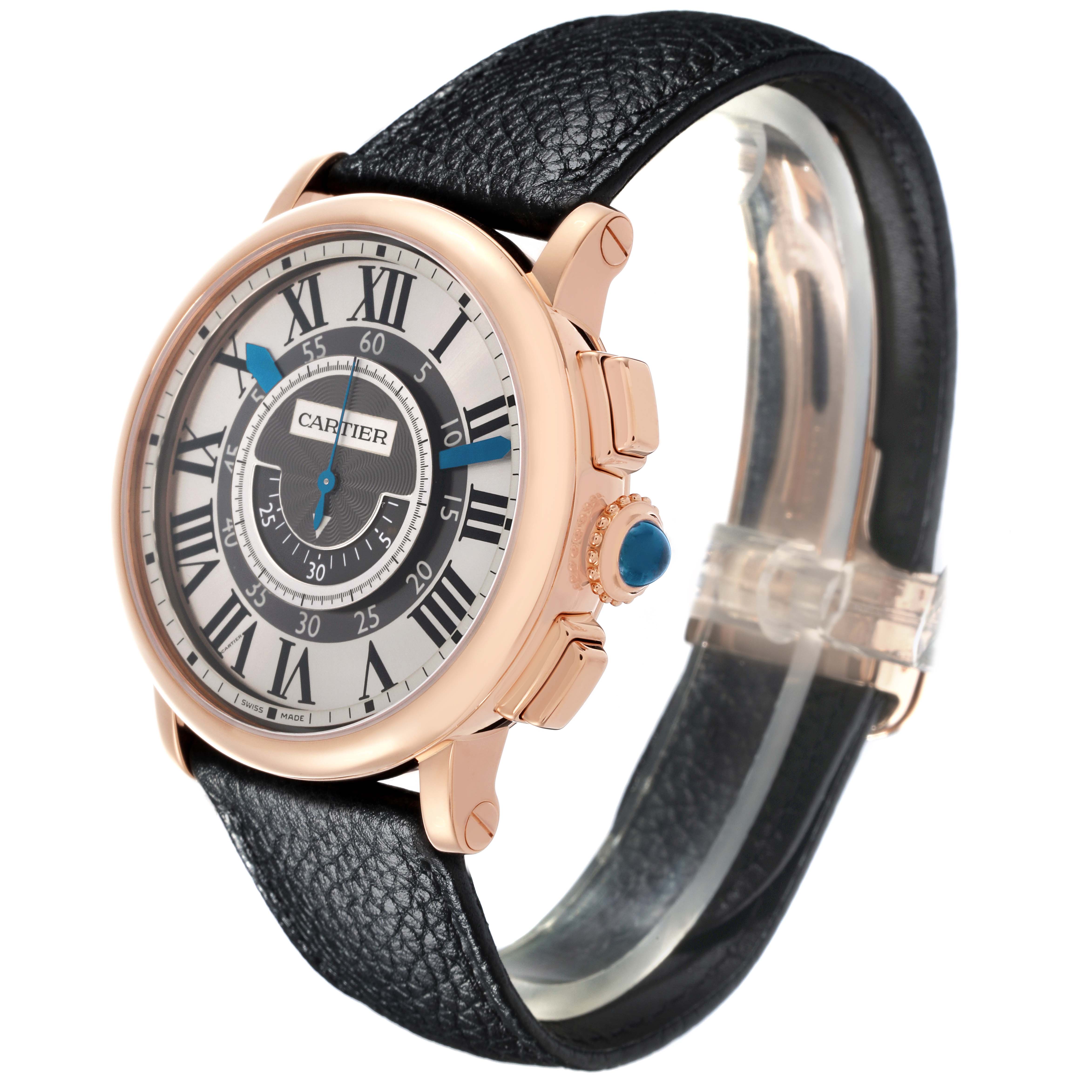 The Cartier Rotonde W1555951 Men
s Rose Gold Grey Dial W1555951 Men
s Rose Gold Grey Dial watch is shown at a three-quarter angle, highlighting its face, side, crown, and black leather strap.