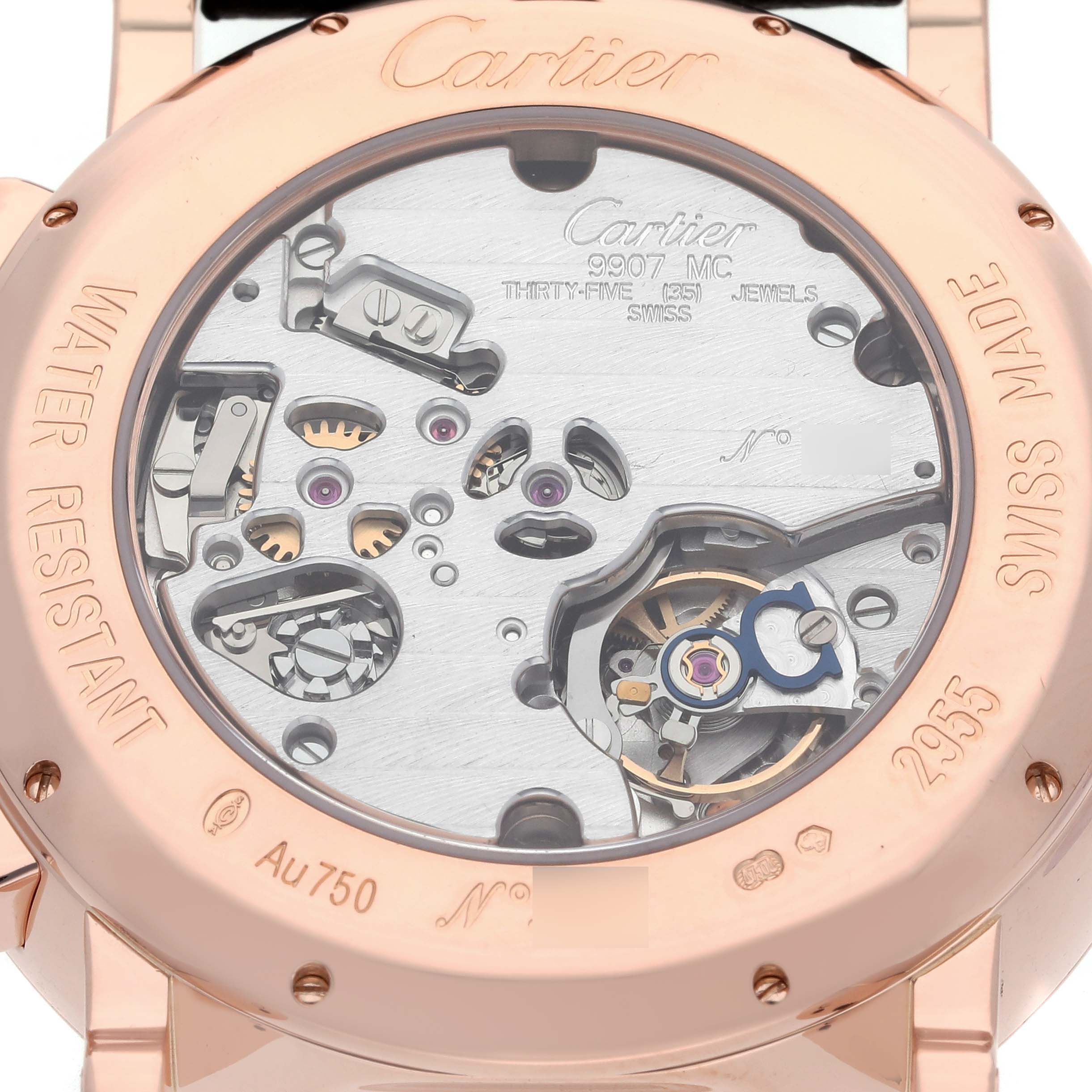 The image shows the back of the Cartier Rotonde W1555951 Men
s Rose Gold Grey Dial W1555951 Men
s Rose Gold Grey Dial watch, highlighting its intricate movement and engravings.