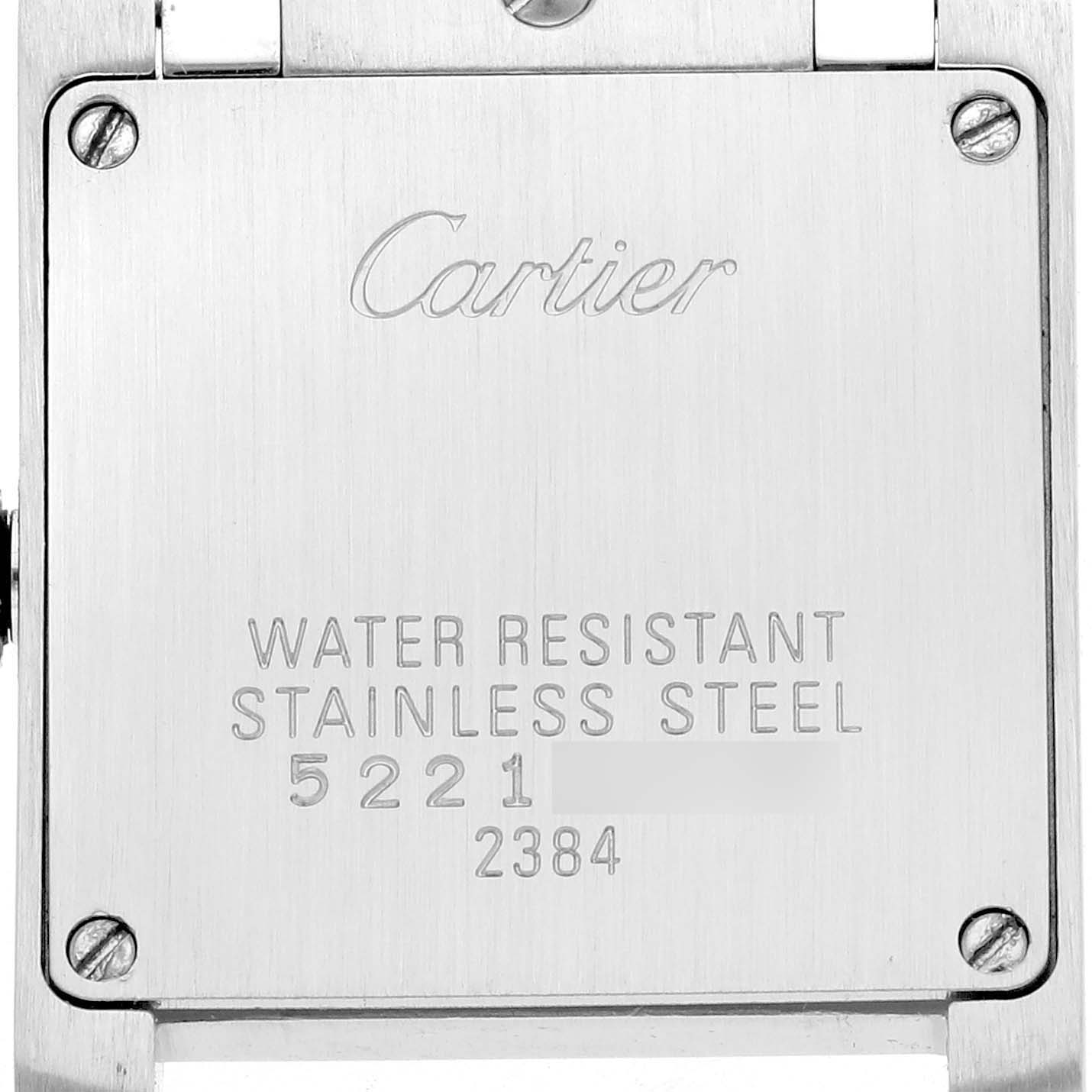 The image shows the back of a Cartier Tank Française watch, highlighting its stainless steel case and engraved details.