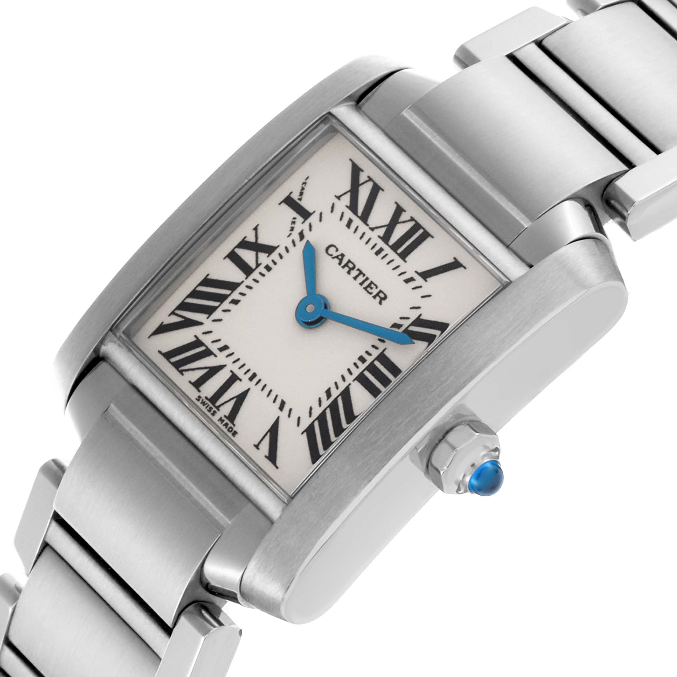 The Cartier Tank Française watch is shown at an angle, highlighting the face, bracelet, and blue sapphire crown.