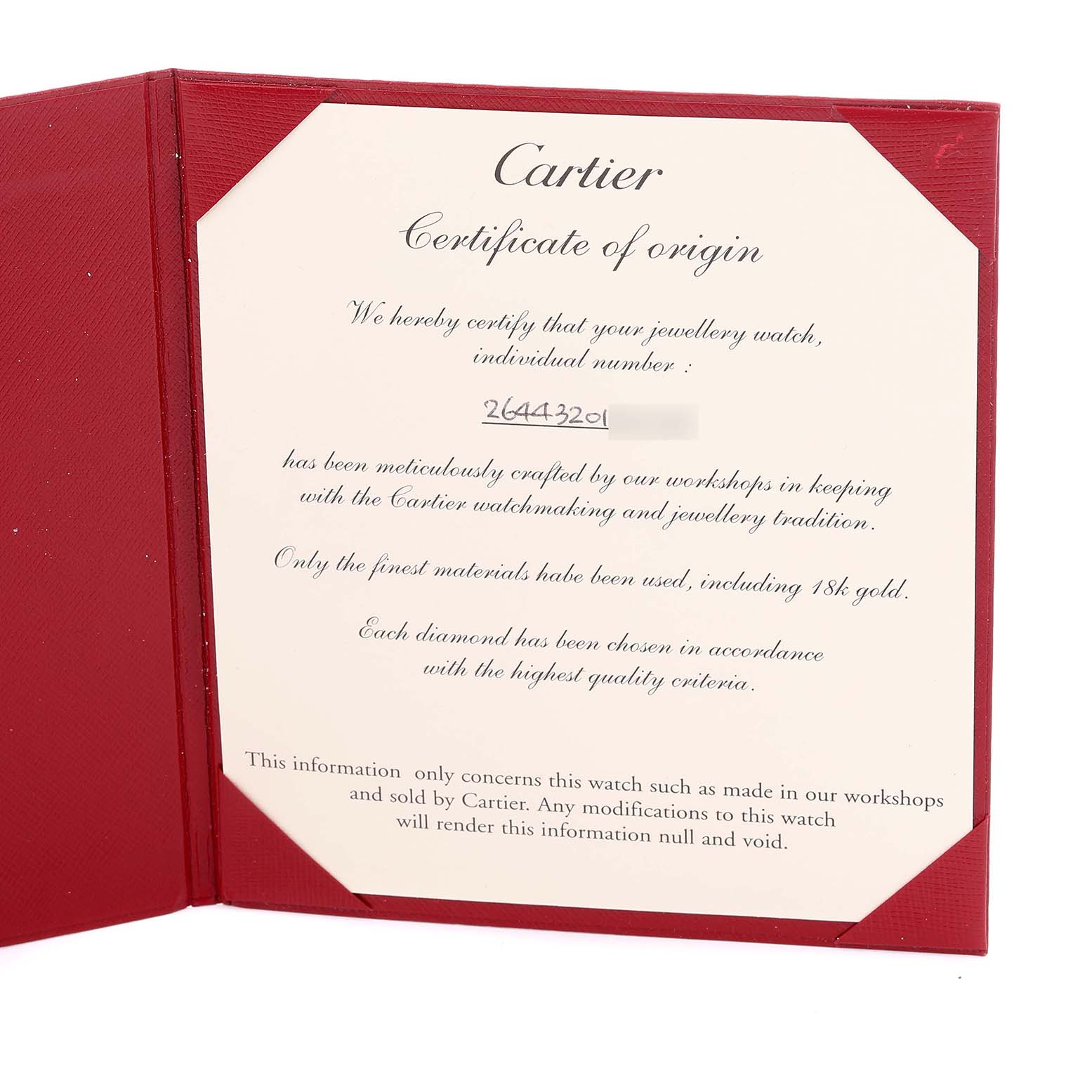 The image shows a Cartier Certificate of Origin displayed at an angle inside a red folder for the Tortue model watch.
