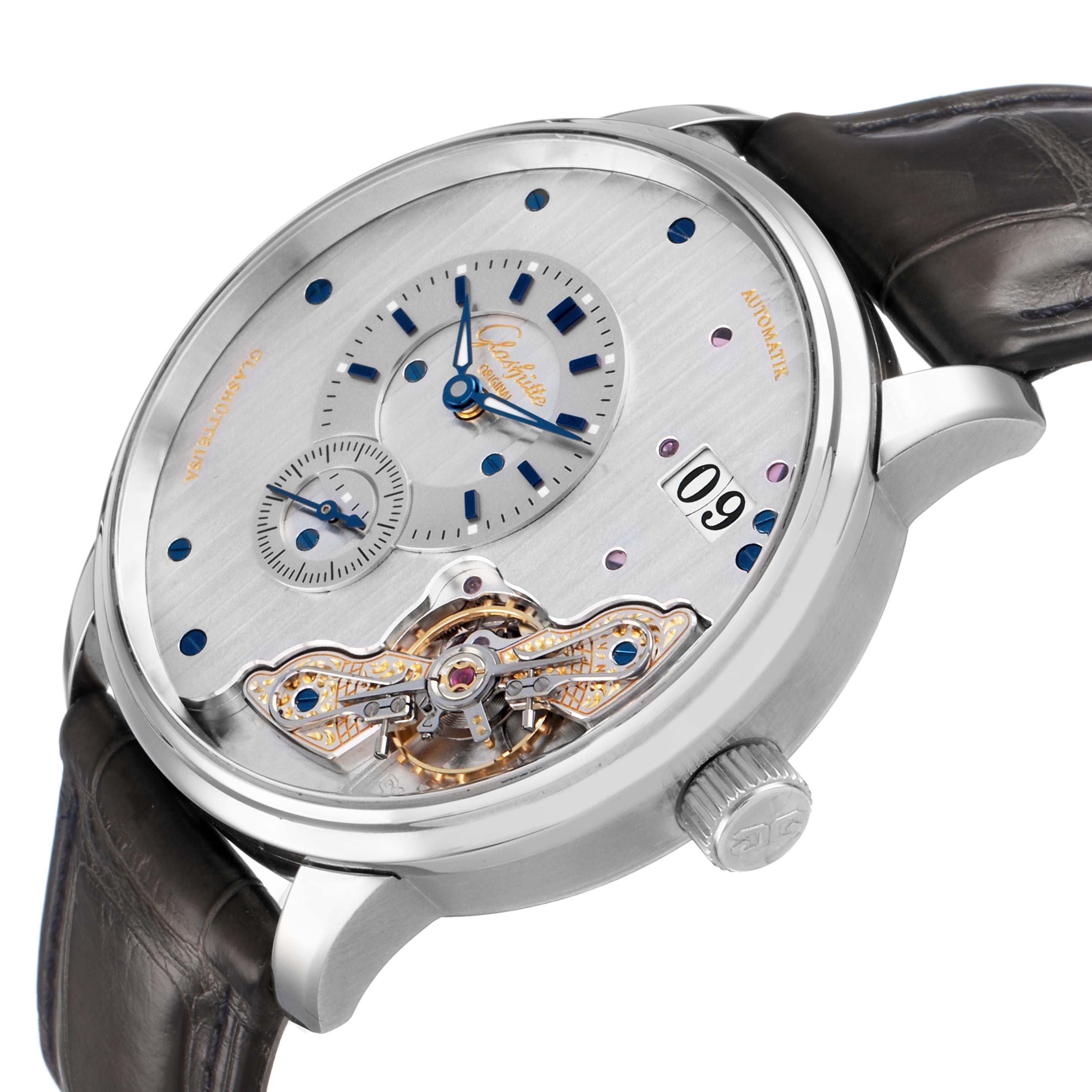 The Glashütte Original watch is shown at an angle highlighting the dial, hands, subdial, tourbillon, crown, and date window.