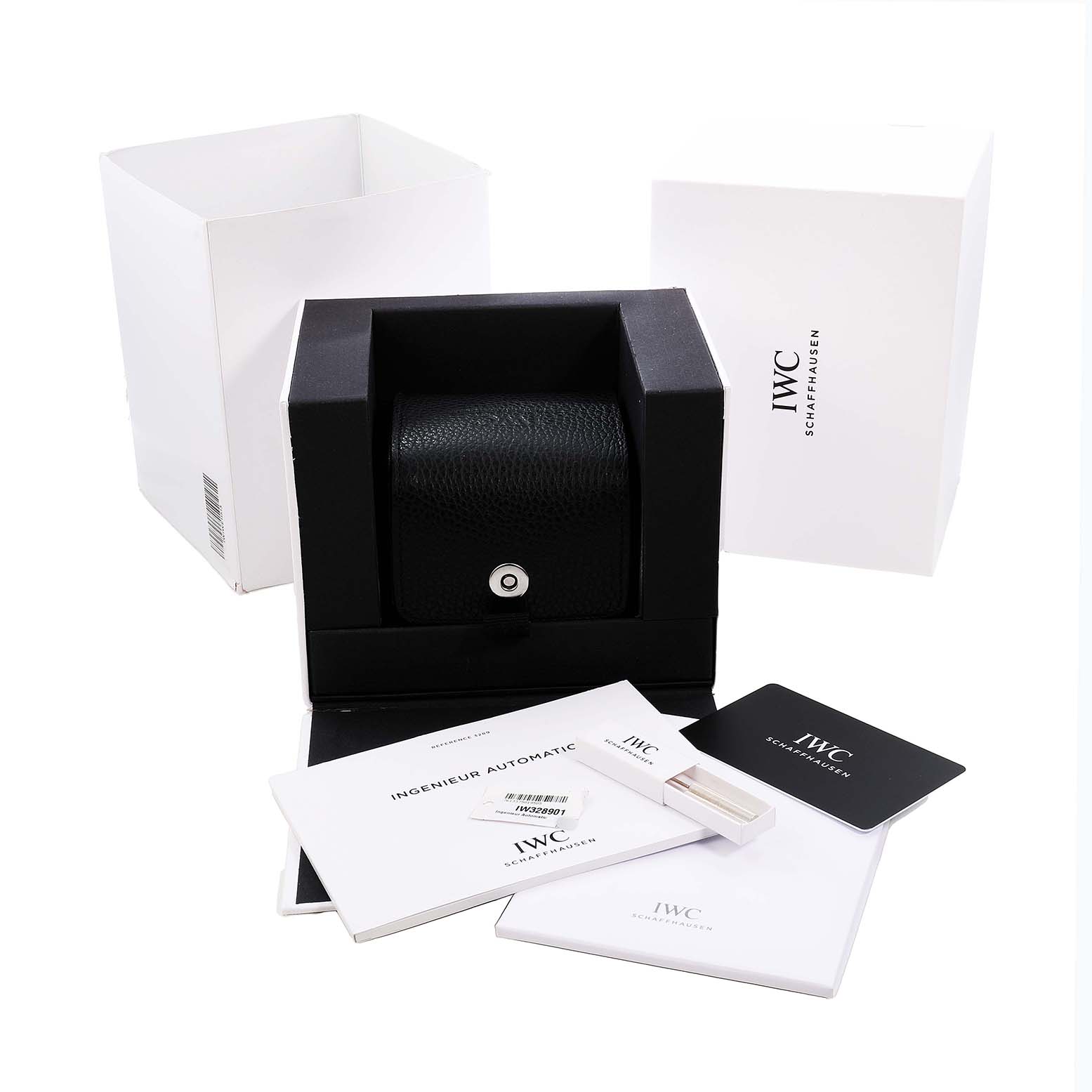 The image shows the packaging of an IWC Ingenieur IW328901 Men's Stainless Steel Black Dial watch, including the box, documents, and accessories from a front angle.