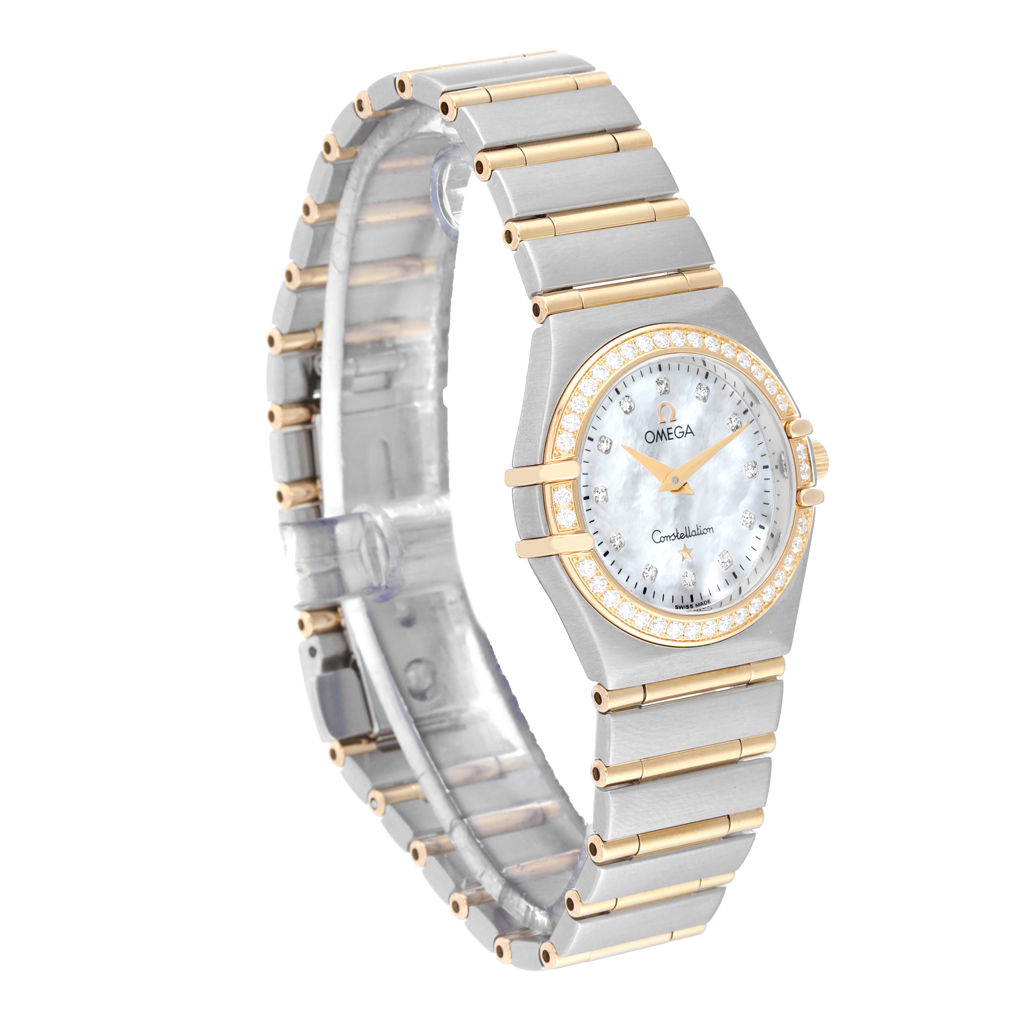 The image shows an angled view of the Omega 1277.75.00 Women's Steel and Gold (two tone) Mother of Pearl Dial 1277.75.00 Women's Steel and Gold (two tone) Mother of Pearl Dial Constellation 95 Steel Yellow Gold Mother Of Pearl Diamond Ladies Watch 1277.75.00, highlighting the face and band.