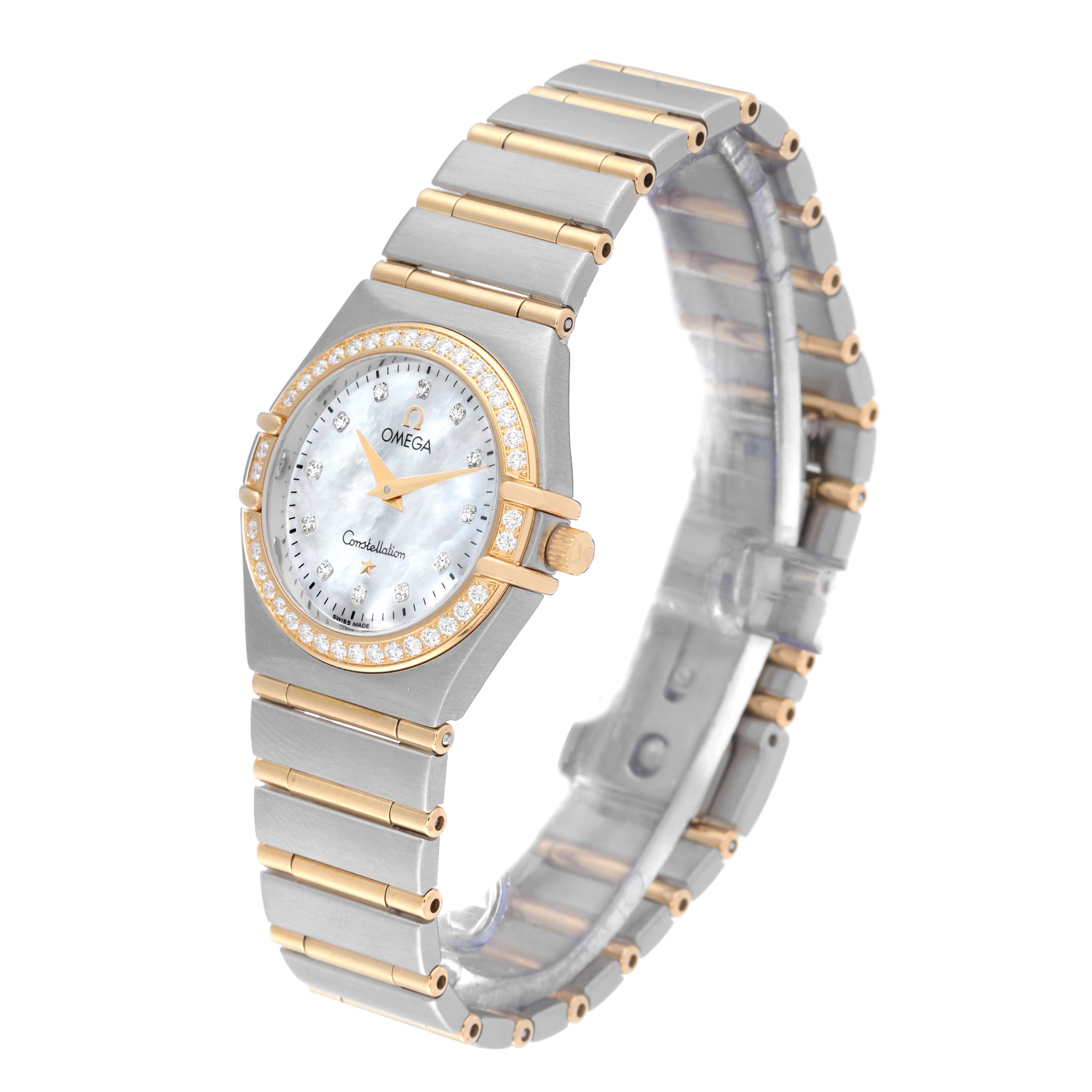 The image shows an angled view of the Omega 1277.75.00 Women's Steel and Gold (two tone) Mother of Pearl Dial 1277.75.00 Women's Steel and Gold (two tone) Mother of Pearl Dial Constellation 95 Steel Yellow Gold Mother Of Pearl Diamond Ladies Watch 1277.75.00, displaying its face and bracelet.