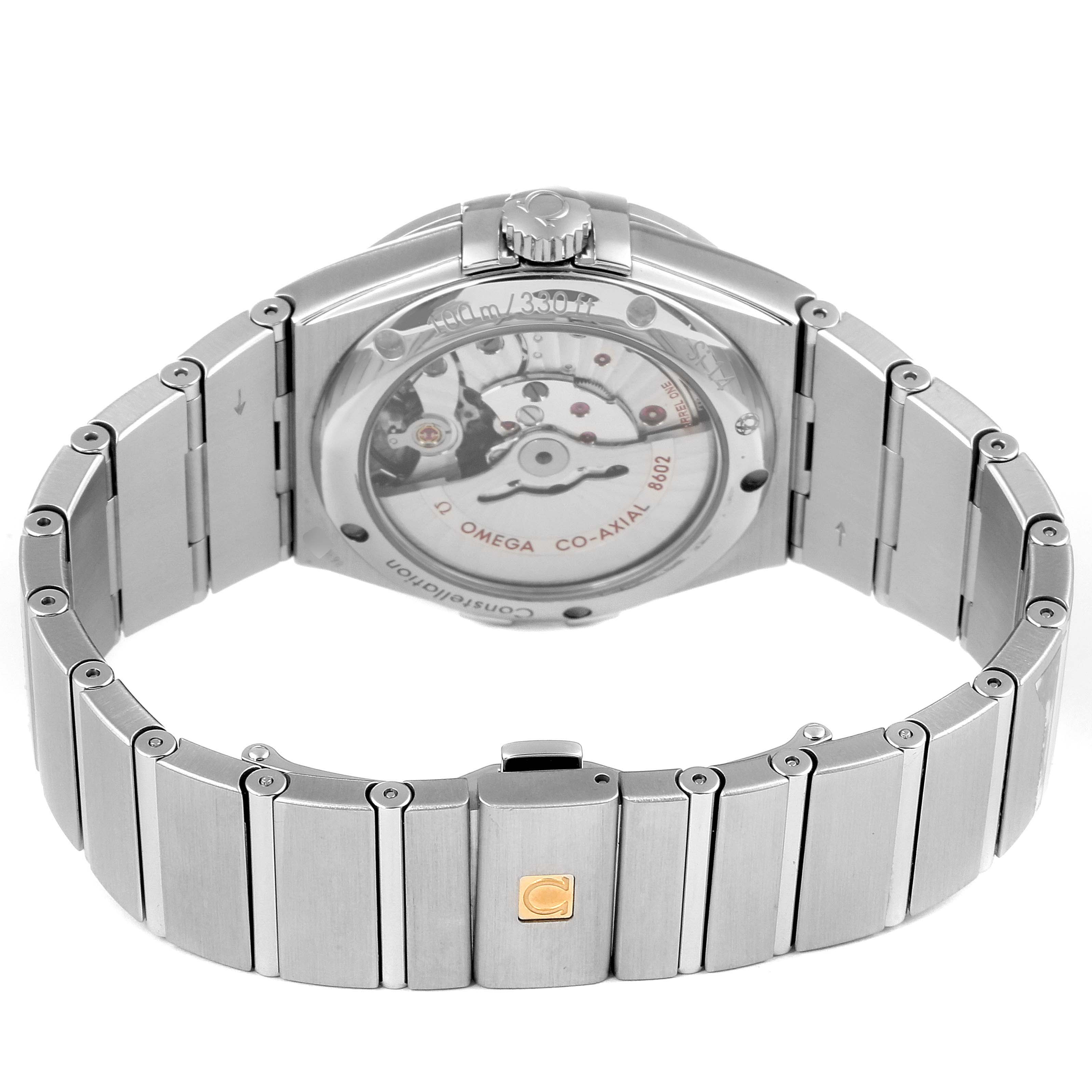 This image shows the back of the Omega Constellation 123.10.38.22.01.001 Men's Stainless Steel Black Dial 123.10.38.22.01.001 Men's Stainless Steel Black Dial watch, highlighting its transparent case back, crown, and stainless steel bracelet.