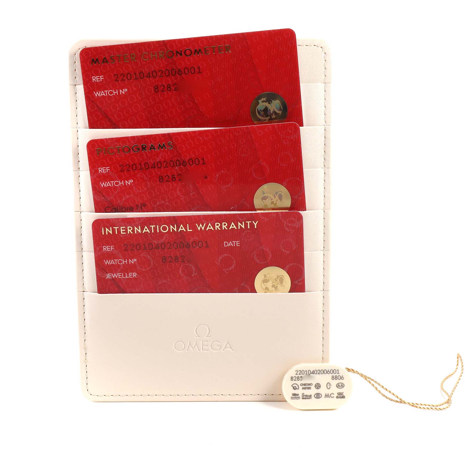 The image shows the warranty and certification cards for an Omega Seamaster 220.10.40.20.06.001 Men
s Stainless Steel Grey Dial 220.10.40.20.06.001 Men
s Stainless Steel Grey Dial watch, along with a tag, in a case.