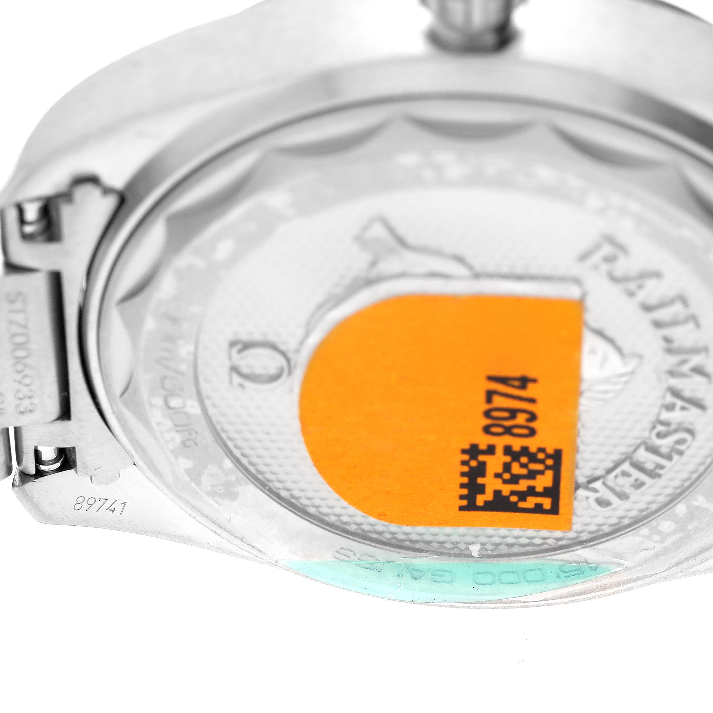 The image shows the backside of an Omega Seamaster 220.10.40.20.01.001 Men
s Stainless Steel Black Dial 220.10.40.20.01.001 Men
s Stainless Steel Black Dial watch, featuring the case back and sticker with a serial number.