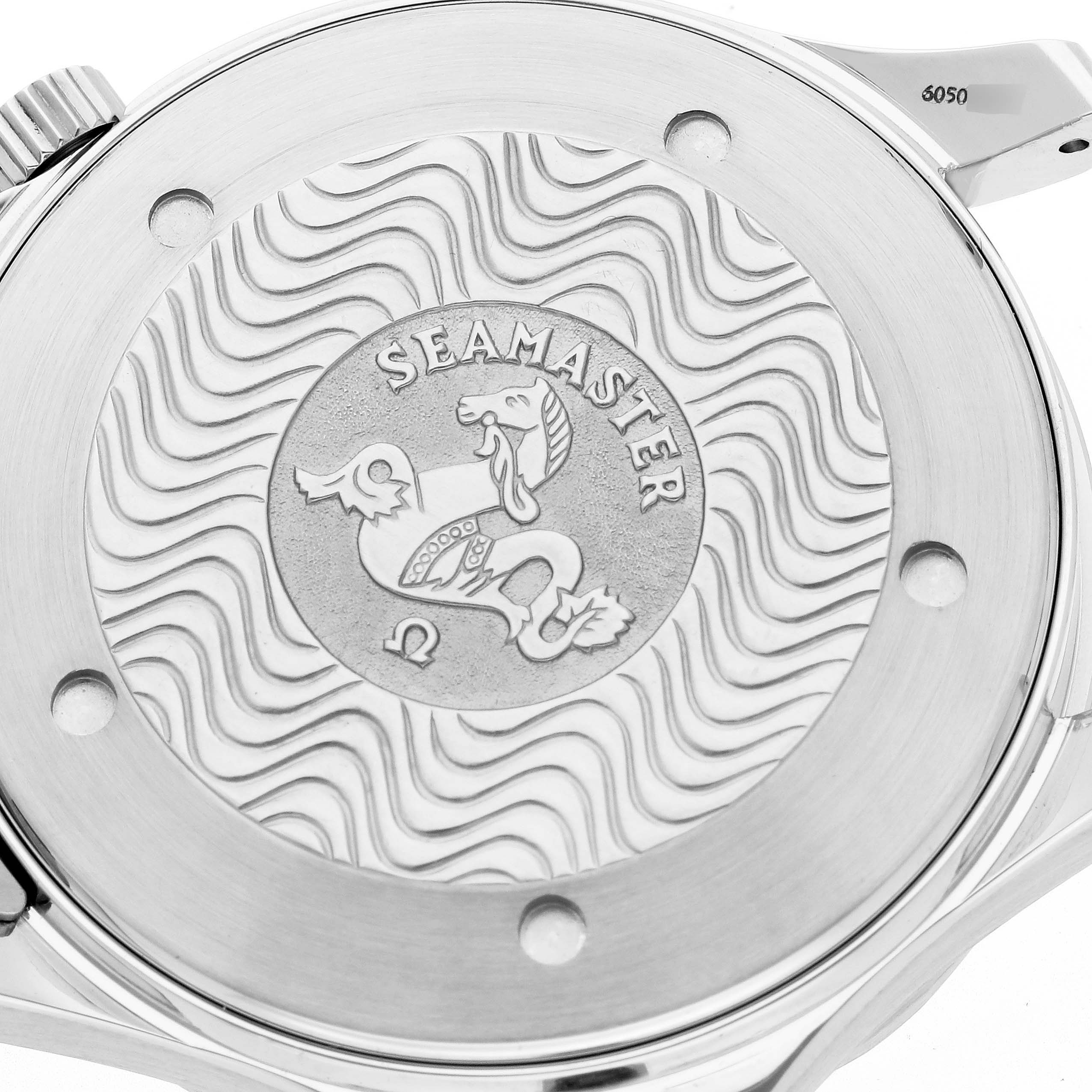 The image shows the case back of an Omega Seamaster 2531.80.00 Men
s Stainless Steel Blue Dial 2531.80.00 Men
s Stainless Steel Blue Dial watch, featuring a wave pattern and a central emblem.