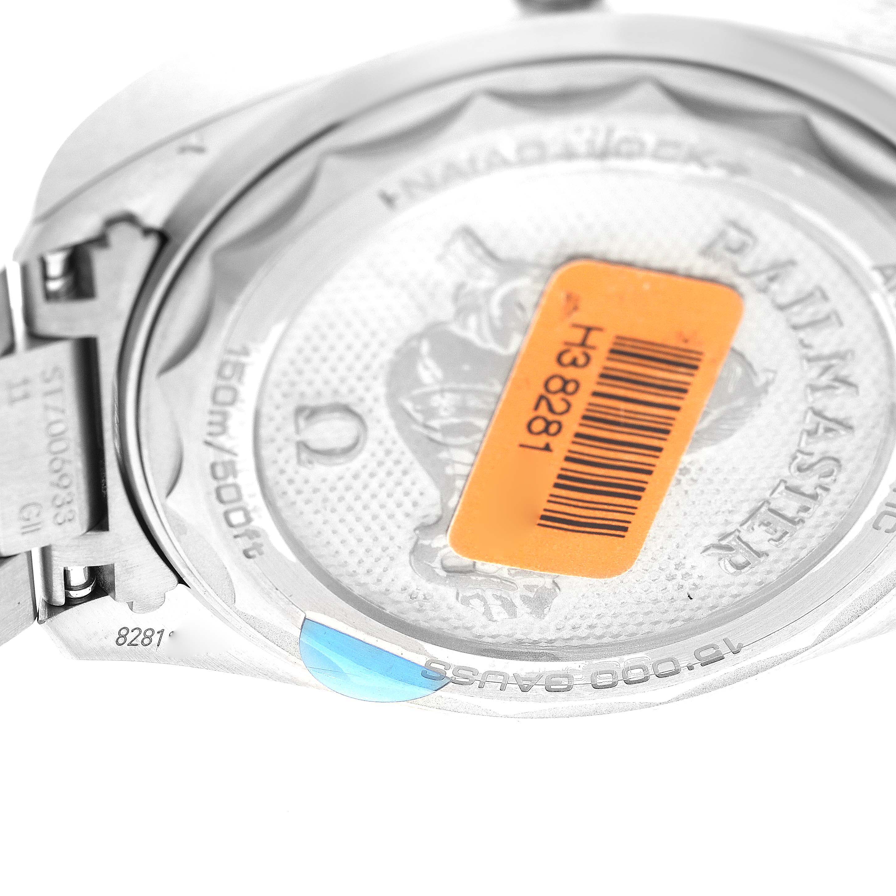 The image shows the back case of the Omega Seamaster 220.10.40.20.03.001 Men
s Stainless Steel Blue Dial 220.10.40.20.03.001 Men
s Stainless Steel Blue Dial watch, featuring the model
s engraved details and an orange barcode sticker.