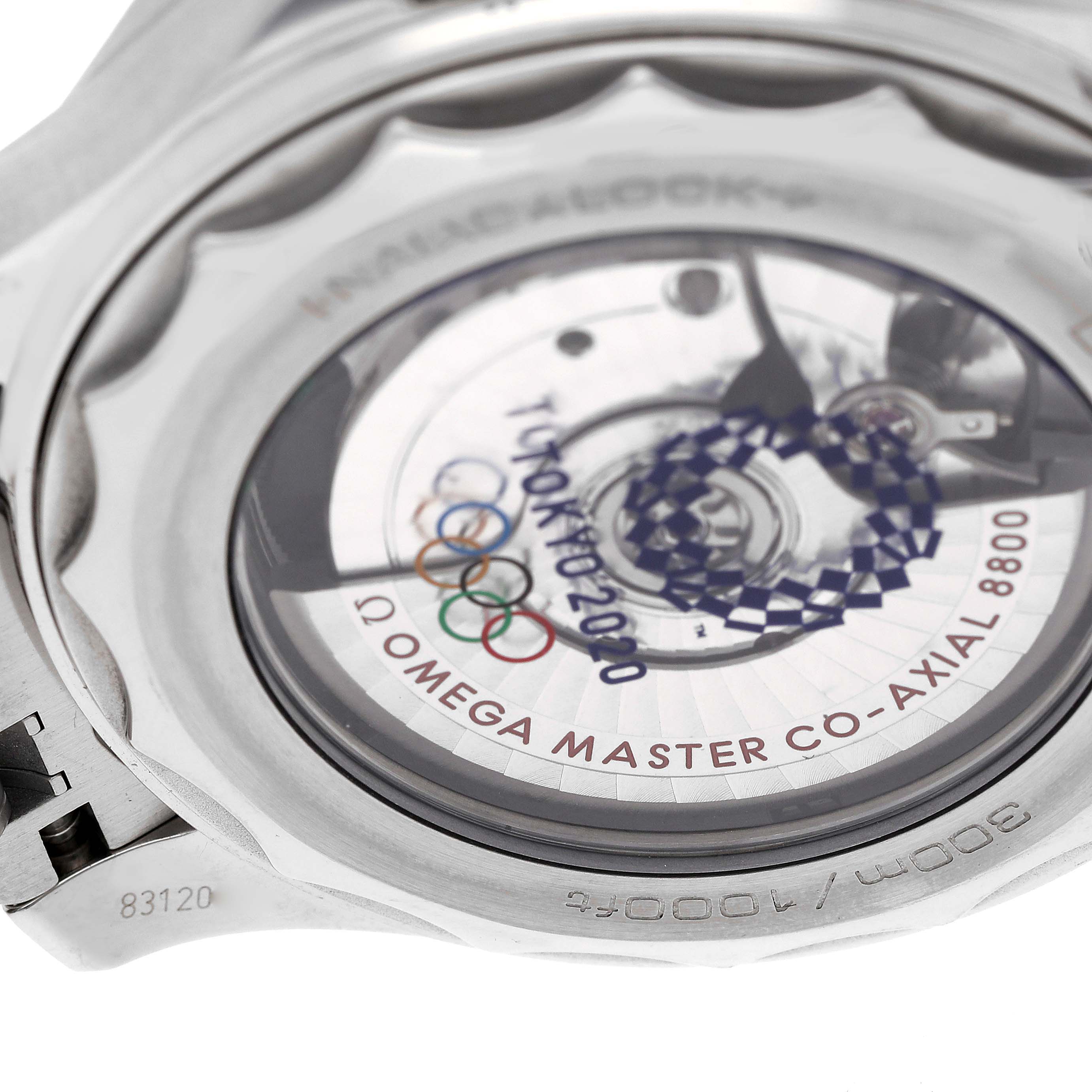 The image shows the back view of an Omega Seamaster 522.30.42.20.04.001 Men's Stainless Steel White Dial 522.30.42.20.04.001 Men's Stainless Steel White Dial watch, highlighting the transparent case back and internal components.