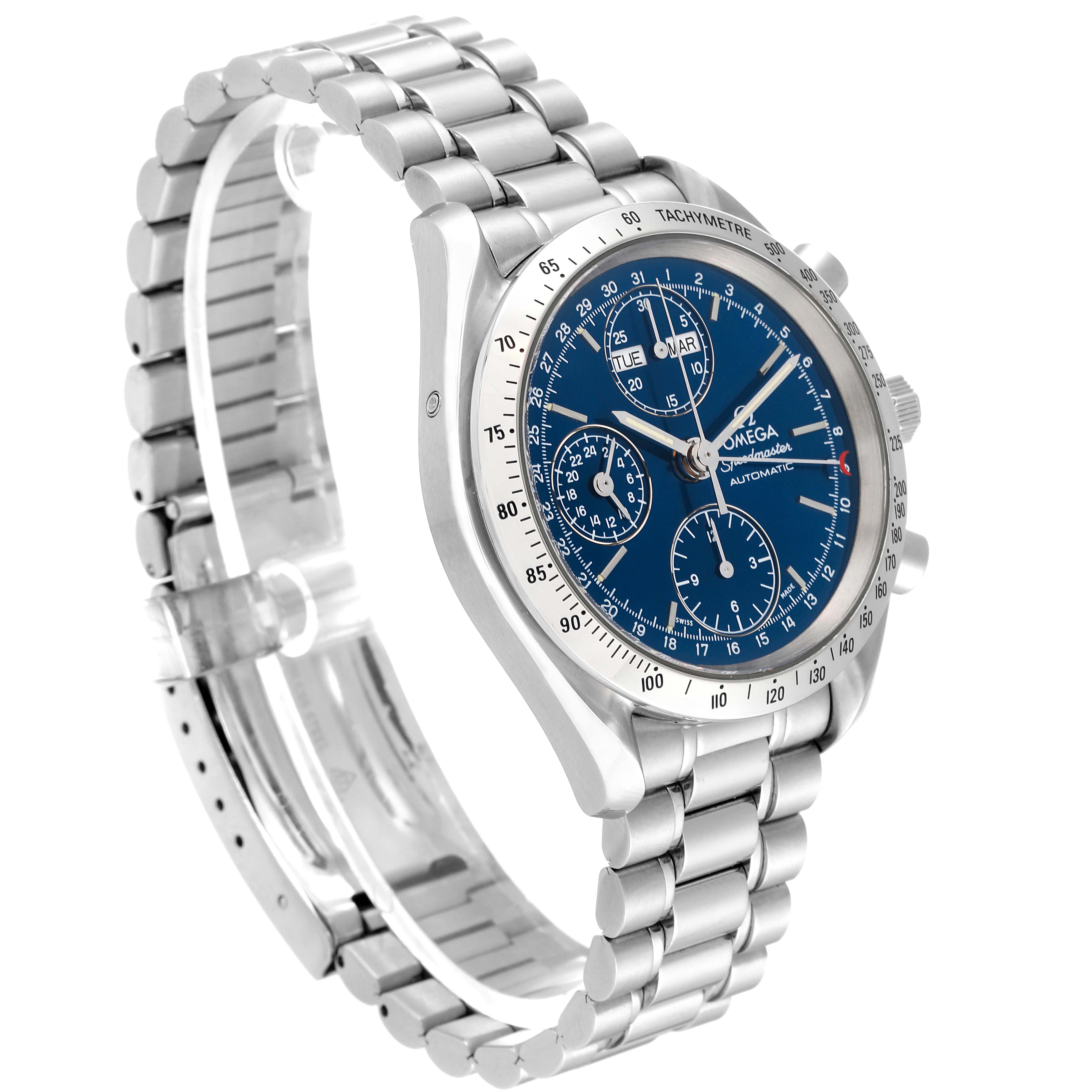 The Omega Speedmaster 3521.80.00 Men
s Stainless Steel Blue Dial 3521.80.00 Men
s Stainless Steel Blue Dial watch is shown at a slight side angle, displaying its blue dial, stainless steel bracelet, and tachymeter bezel.