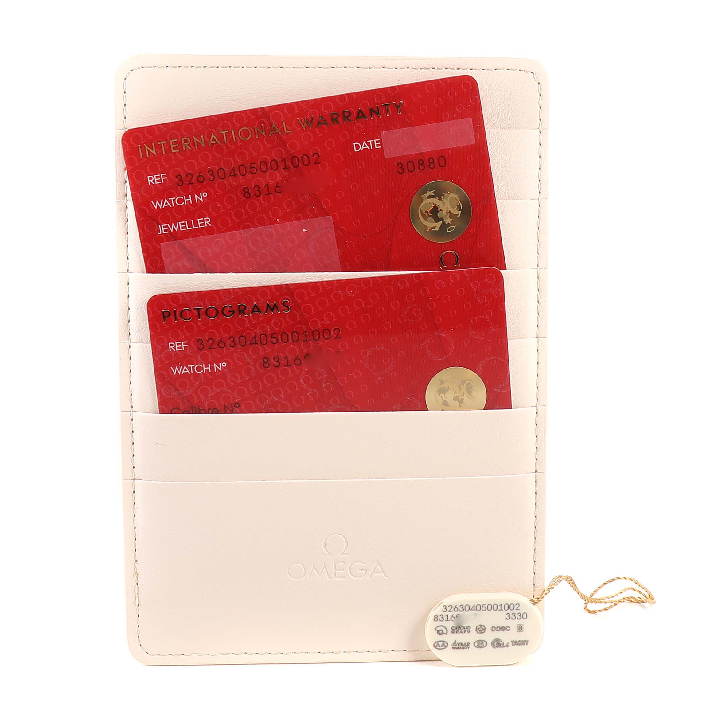 The image shows an Omega Speedmaster 326.30.40.50.01.002 Men
s Stainless Steel Black Dial 326.30.40.50.01.002 Men
s Stainless Steel Black Dial
s warranty card and pictograms card held in a white cardholder, accompanied by a tag.