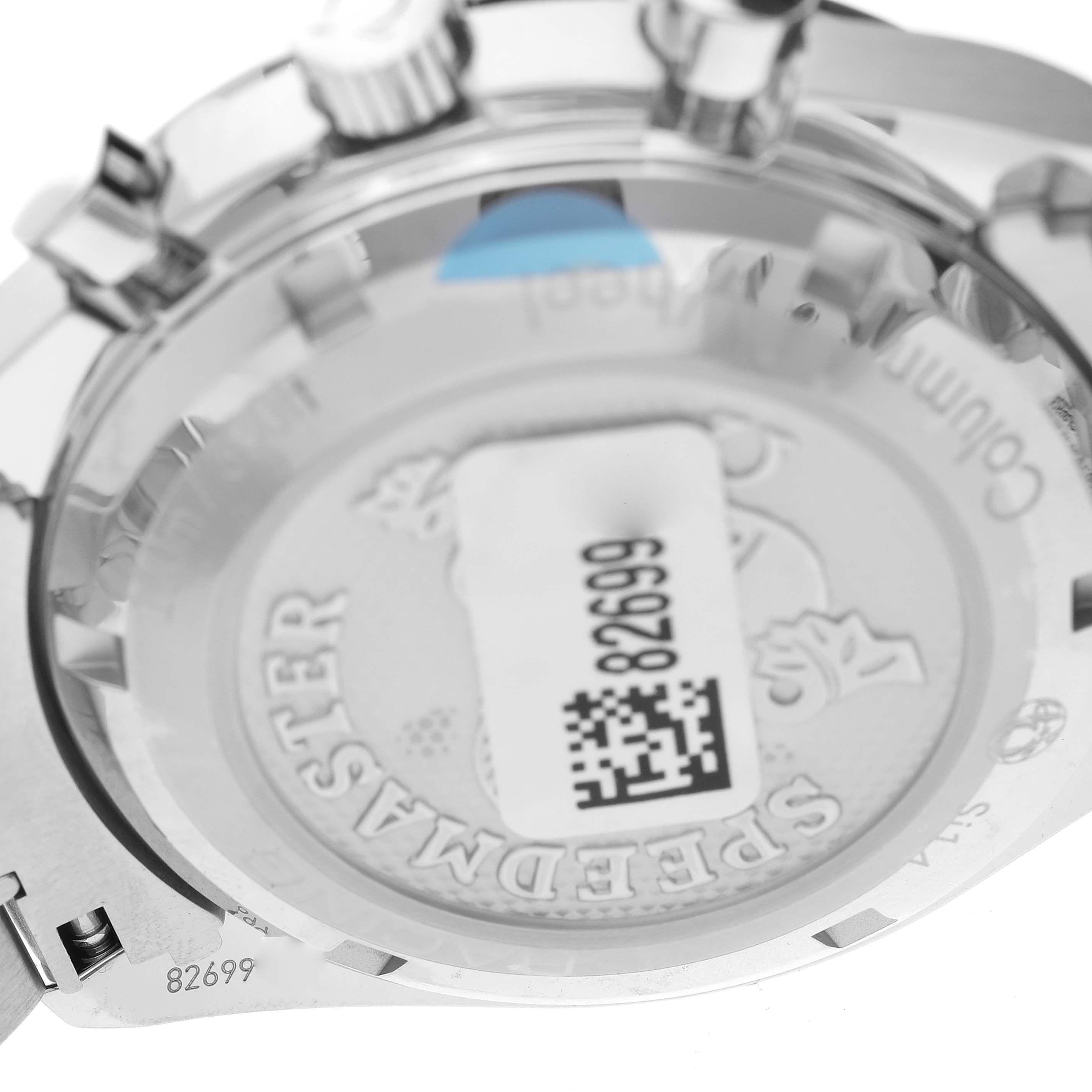 The image shows the back case and part of the crown of an Omega Speedmaster 326.30.40.50.01.002 Men
s Stainless Steel Black Dial 326.30.40.50.01.002 Men
s Stainless Steel Black Dial watch from a slightly tilted angle.