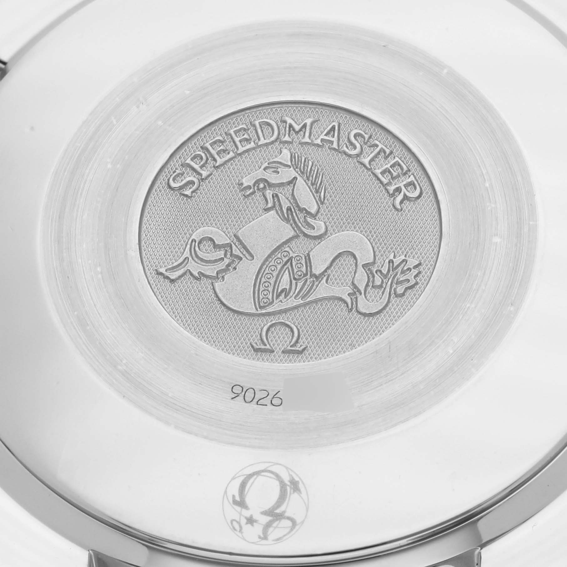 The image shows the case back of an Omega watch, featuring the Speedmaster logo and emblem.